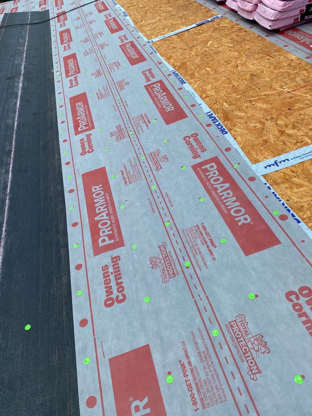 Commercial Roofing Installation using Roof Replacement by American Roofing & Construction LLC