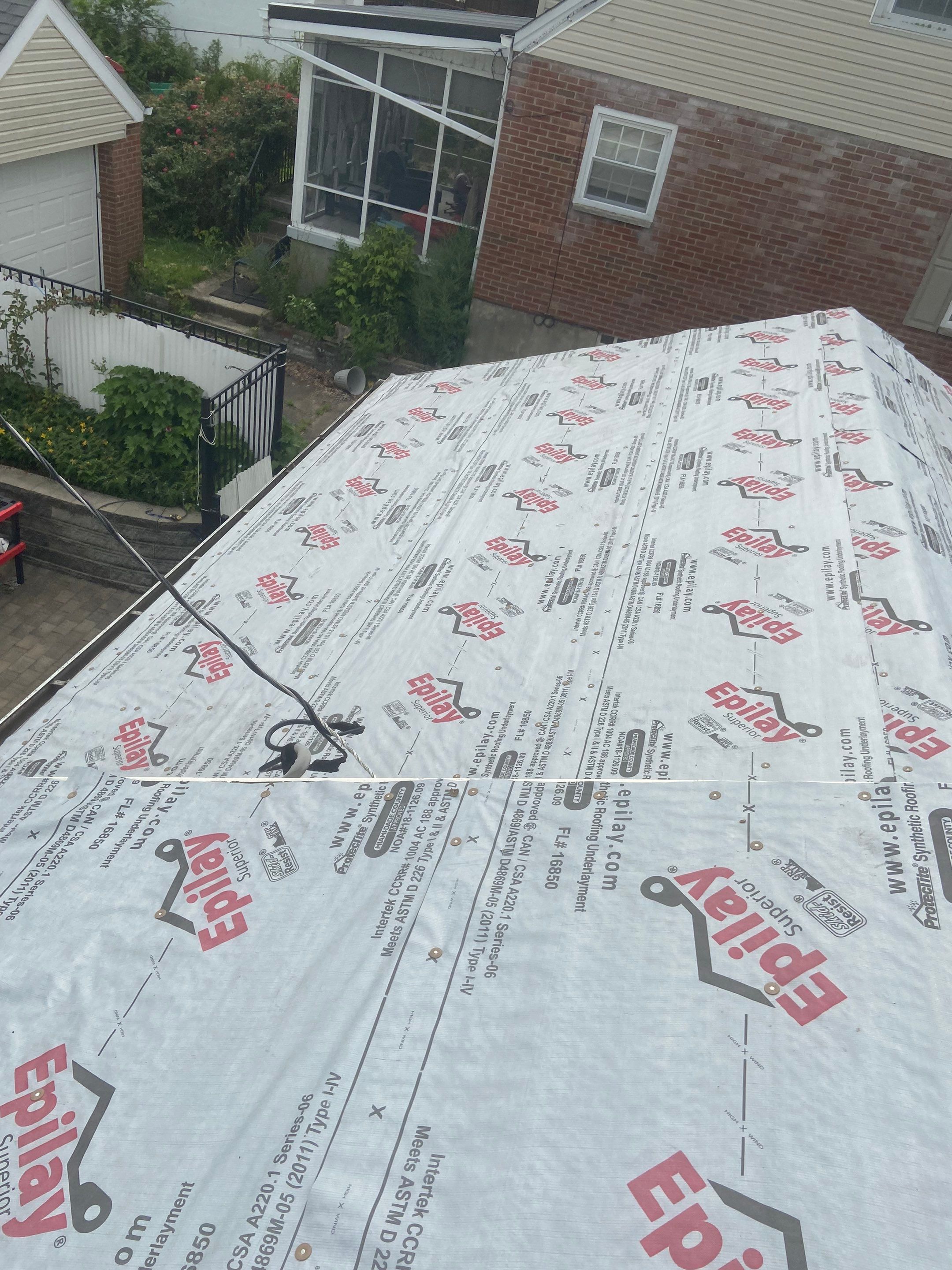Metal Roofing, Skylights, Porch Build by Secure Construction Company Inc
