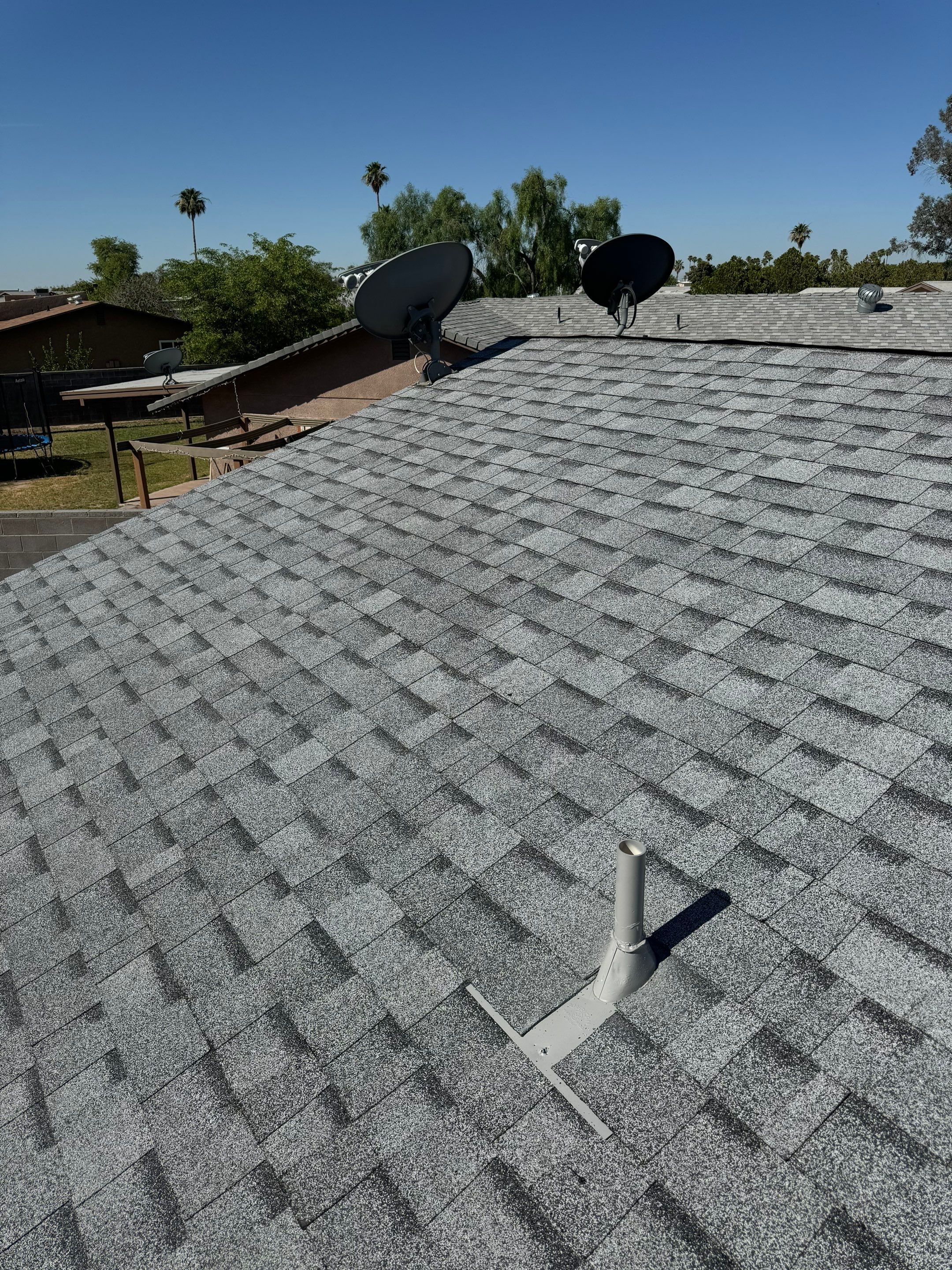 Estate Gray Shingles by Reimagine Roofing