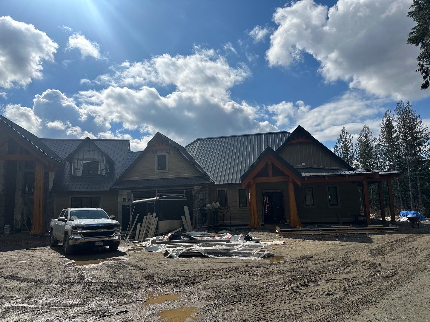 Residential Roofing Installation using 12" Prolok metal by Top Notch Roofing Inc