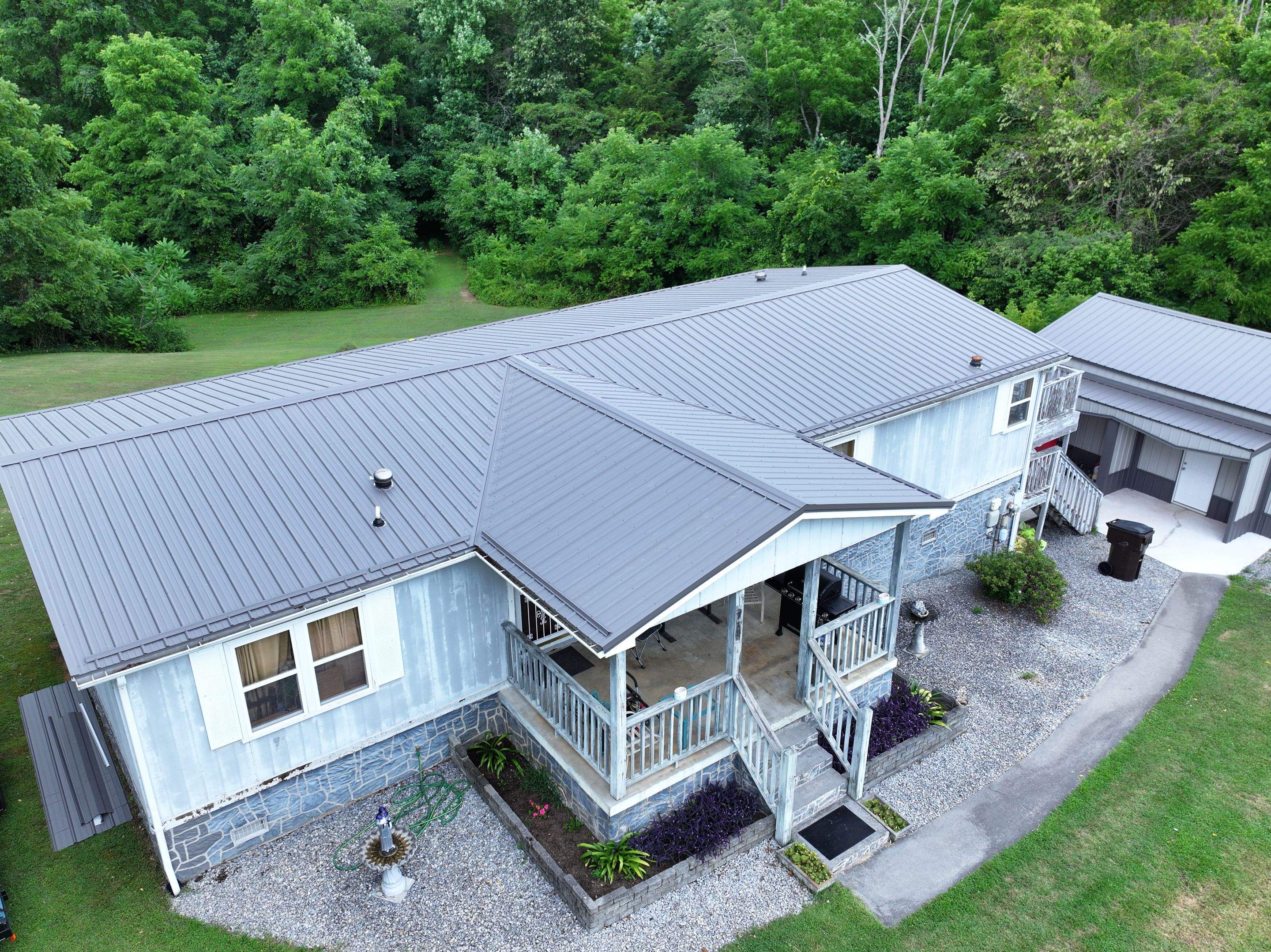 Hollingshead Residence by Omnia Roofing
