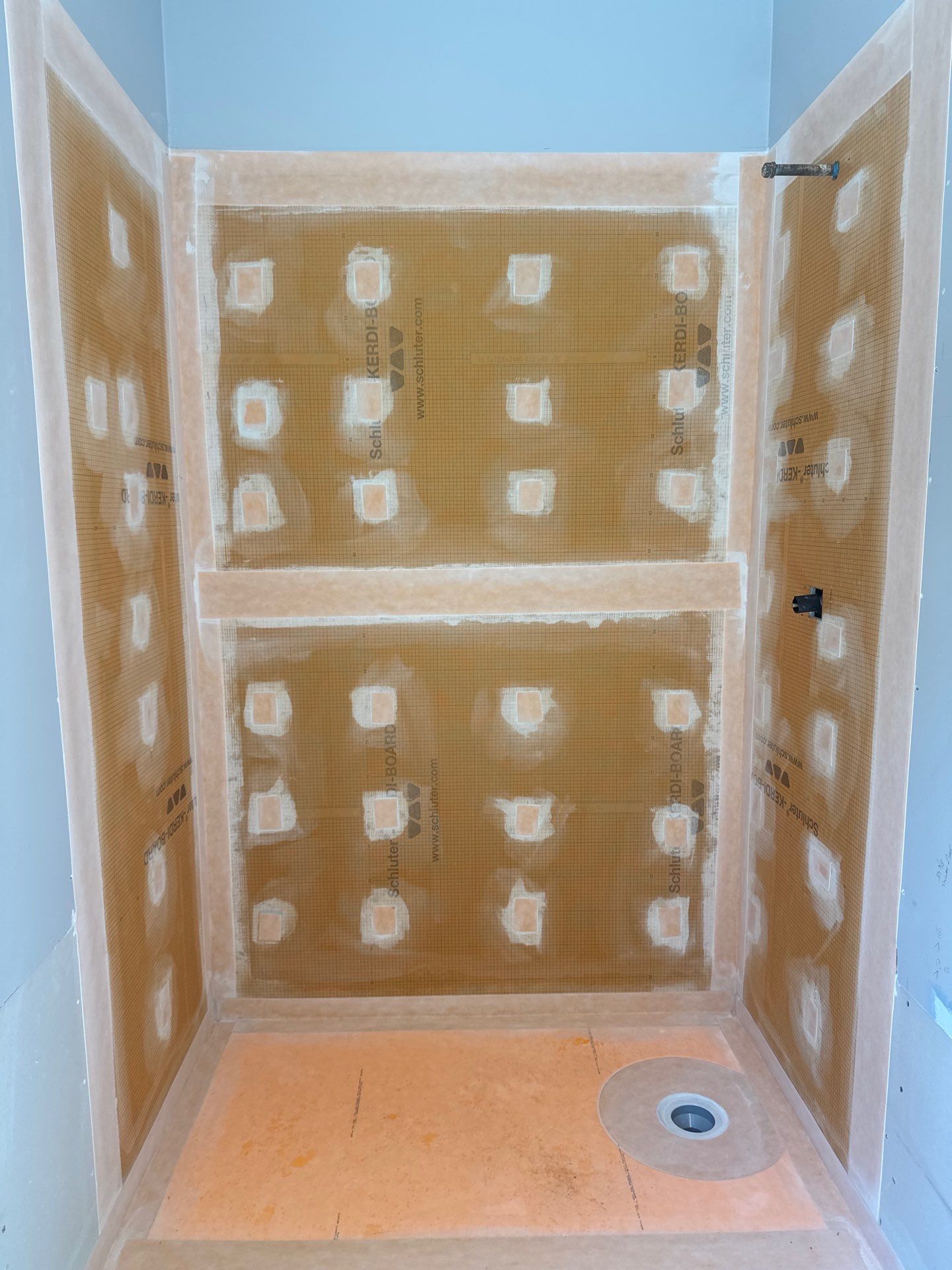 Marietta Bathroom Remodel with Marble Tile and Pebble Floor by Swift Home Renovations