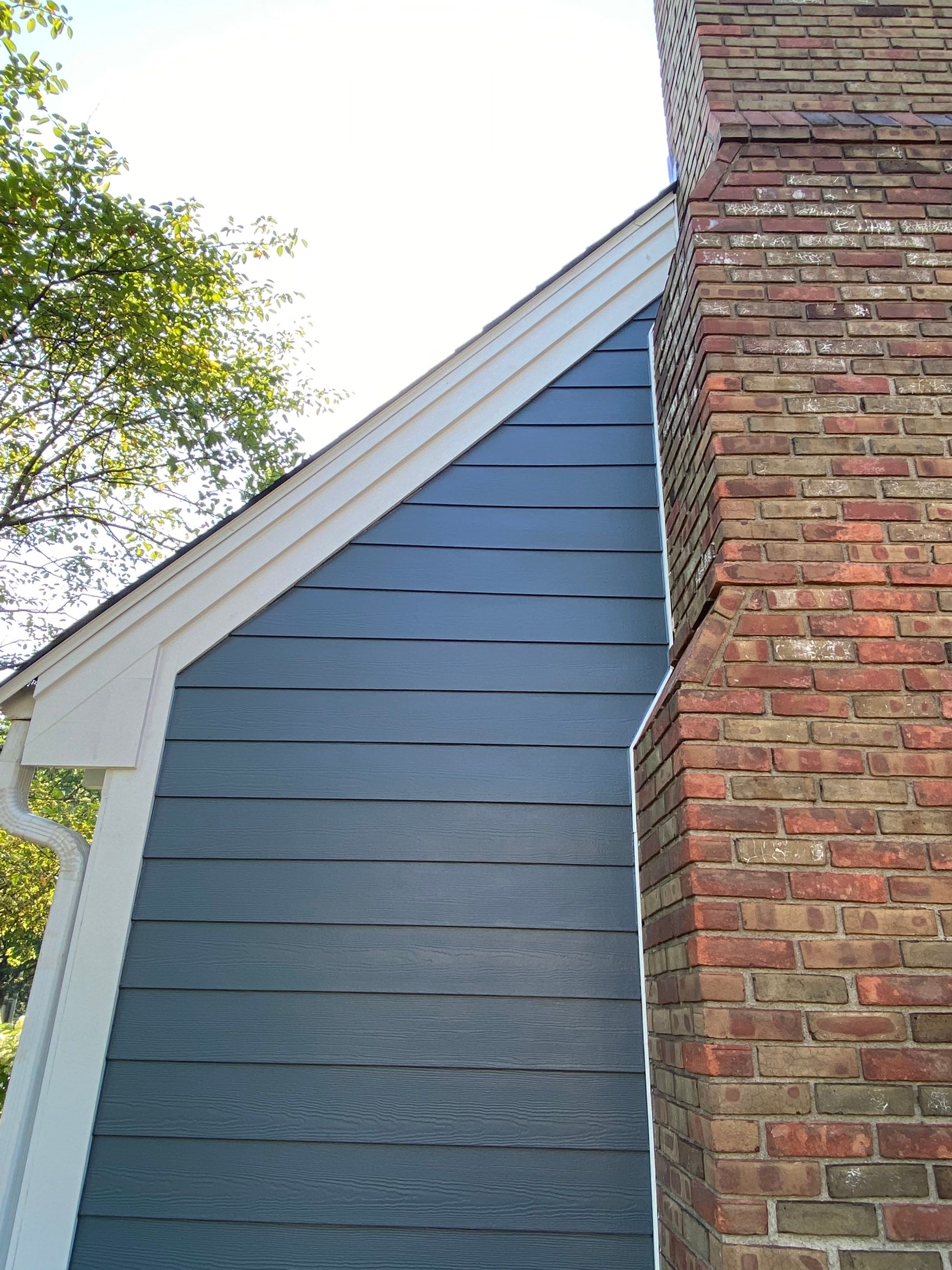 Residential Roofing Installation using James Hardie Fiber Cement Lap Siding and Certainteed Landmark Pro Shingles by Best Exteriors Inc