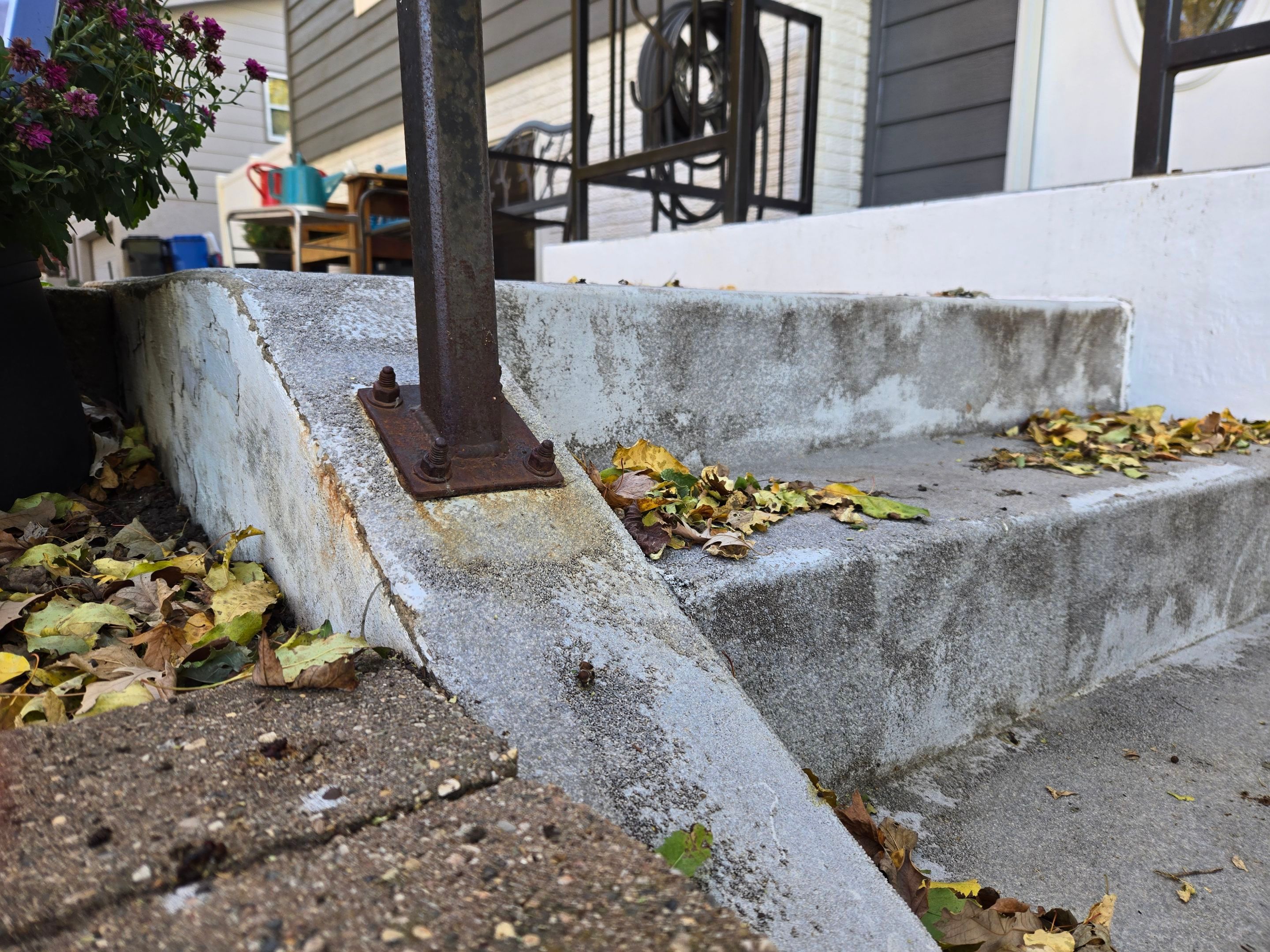 Grey Polyaspartic Porch and Stair Resurfacing in Sioux Falls by Select Painting, Coatings & Garage Cabinets