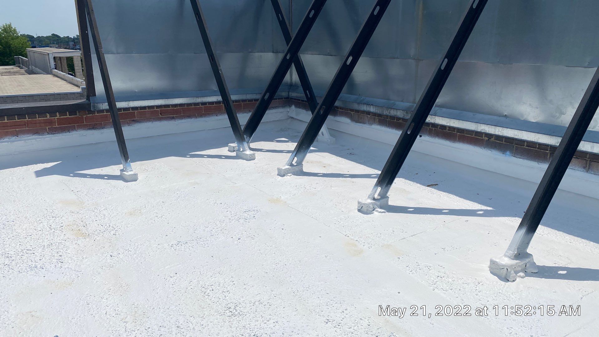 Commercial Roof Coating using Fiberseal basecoat and Silicon Topcoat by Just In Time Roofing and Restoration