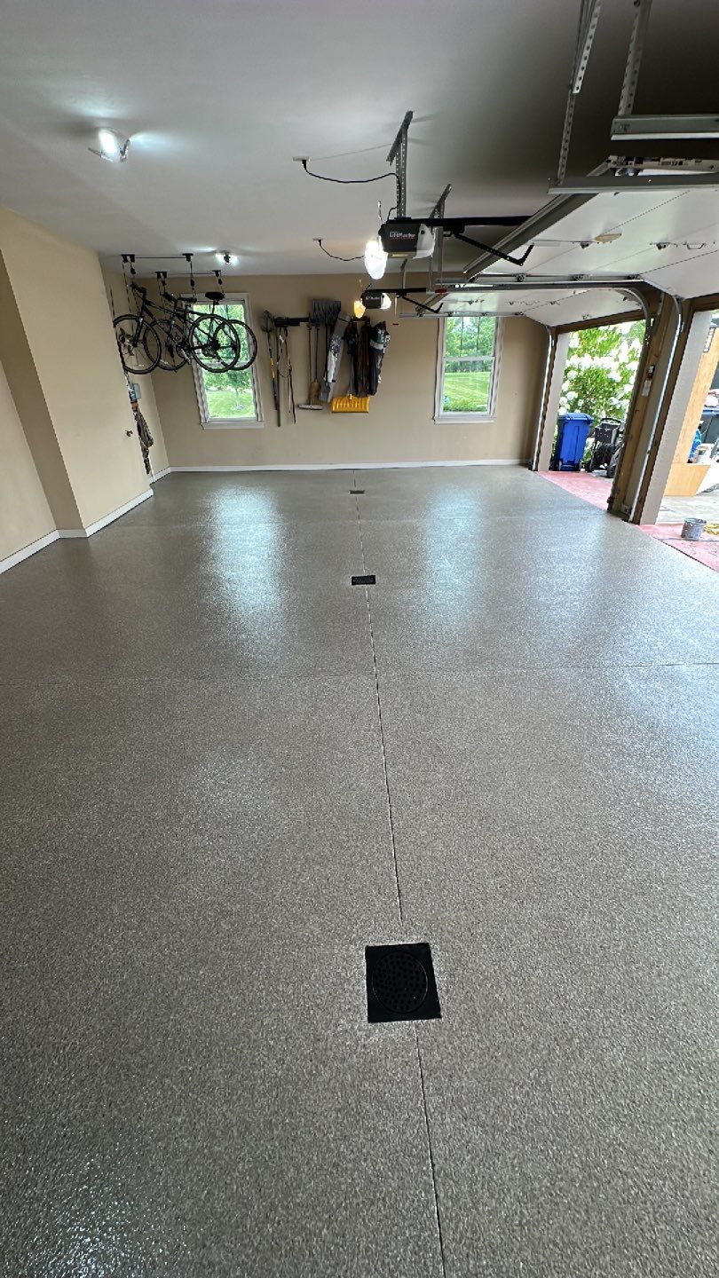 Large Patio + Garage Project in Moon Township by Floors in a Day, Inc