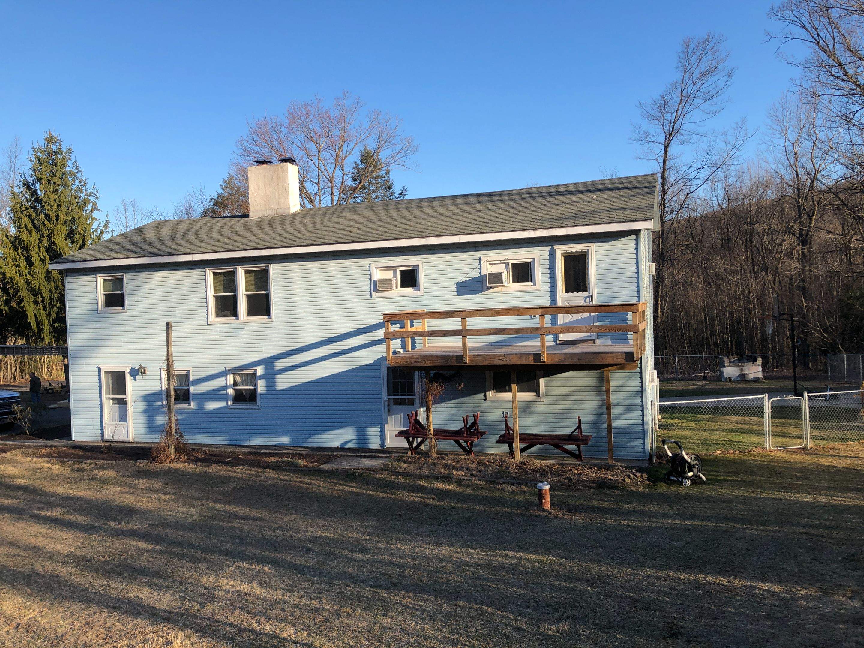 Sage Green Vinyl Siding and Exterior Trim Replacement in Ashland by Esh Builders