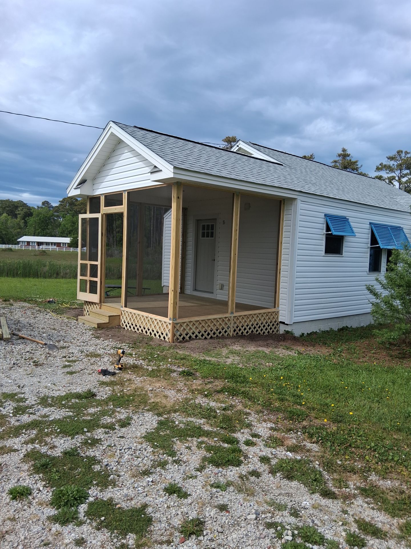 Custom Screened Porch and Deck Addition in Sea Level by The Remodeling Company