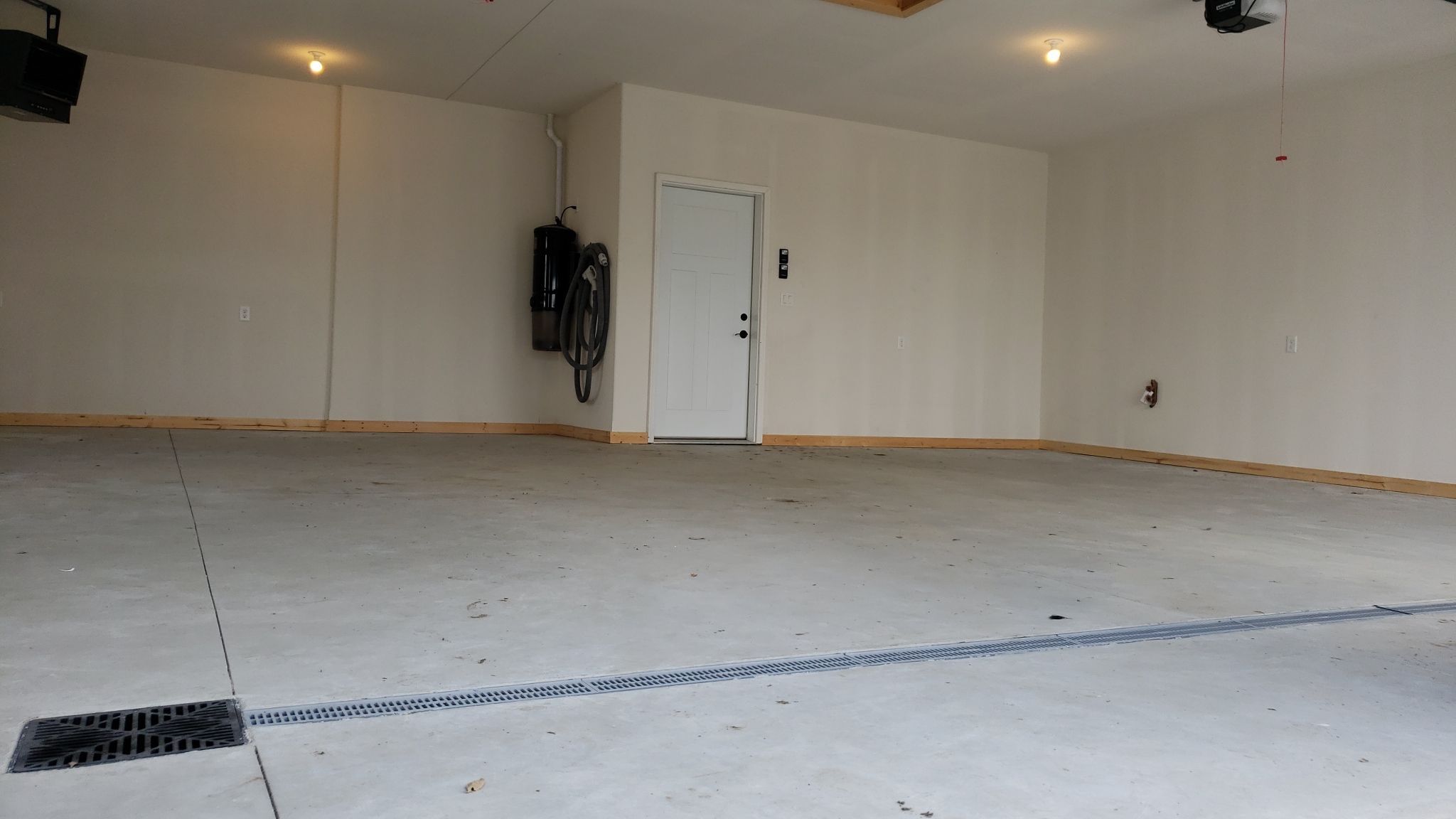 Beautiful Garage Upgrade by Revival Concrete Coatings, LLC