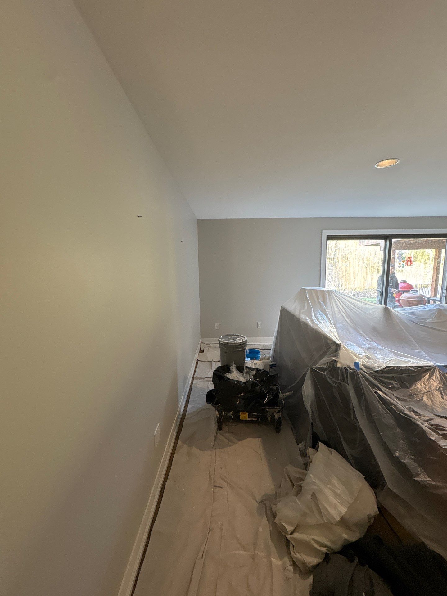 Sioux Falls Interior Painting with Custom Wainscoting and Decorative Wallpaper by Select Painting, Coatings & Garage Cabinets