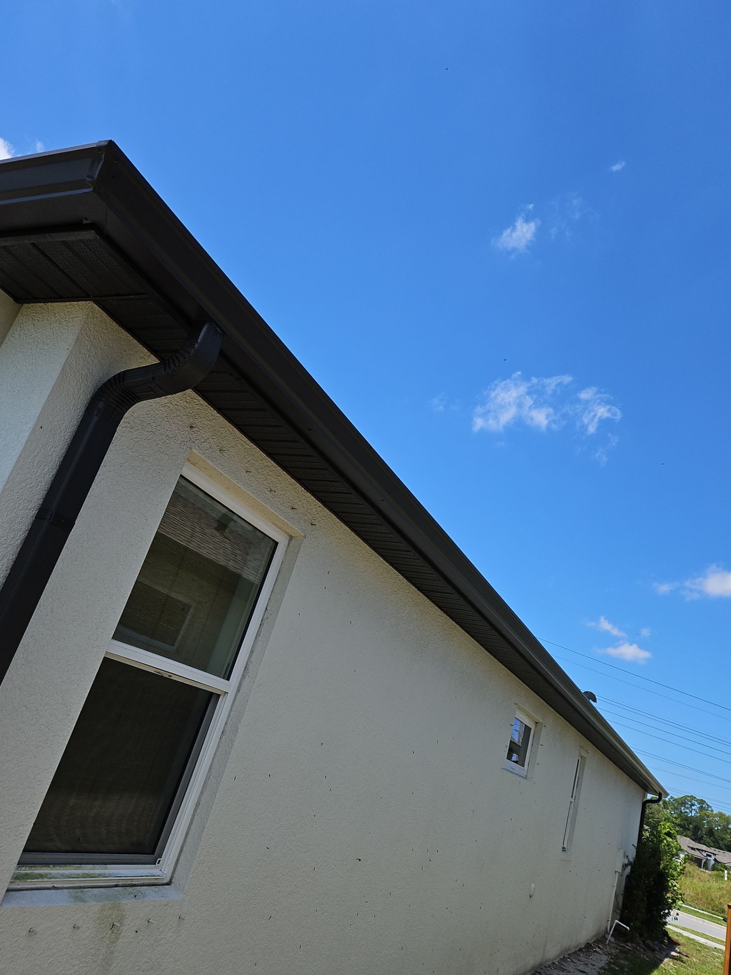 K-Style Seamless Gutter Installation using bronze gutters in Sarasota FL by Gutter Professors