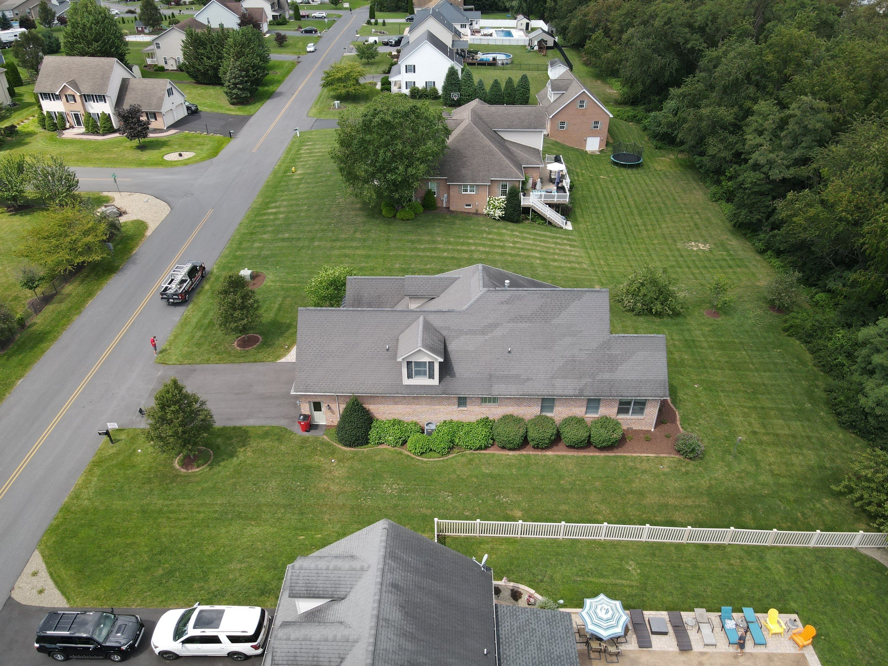 Standing seam / Azm panel in black  by Teflon Roofing