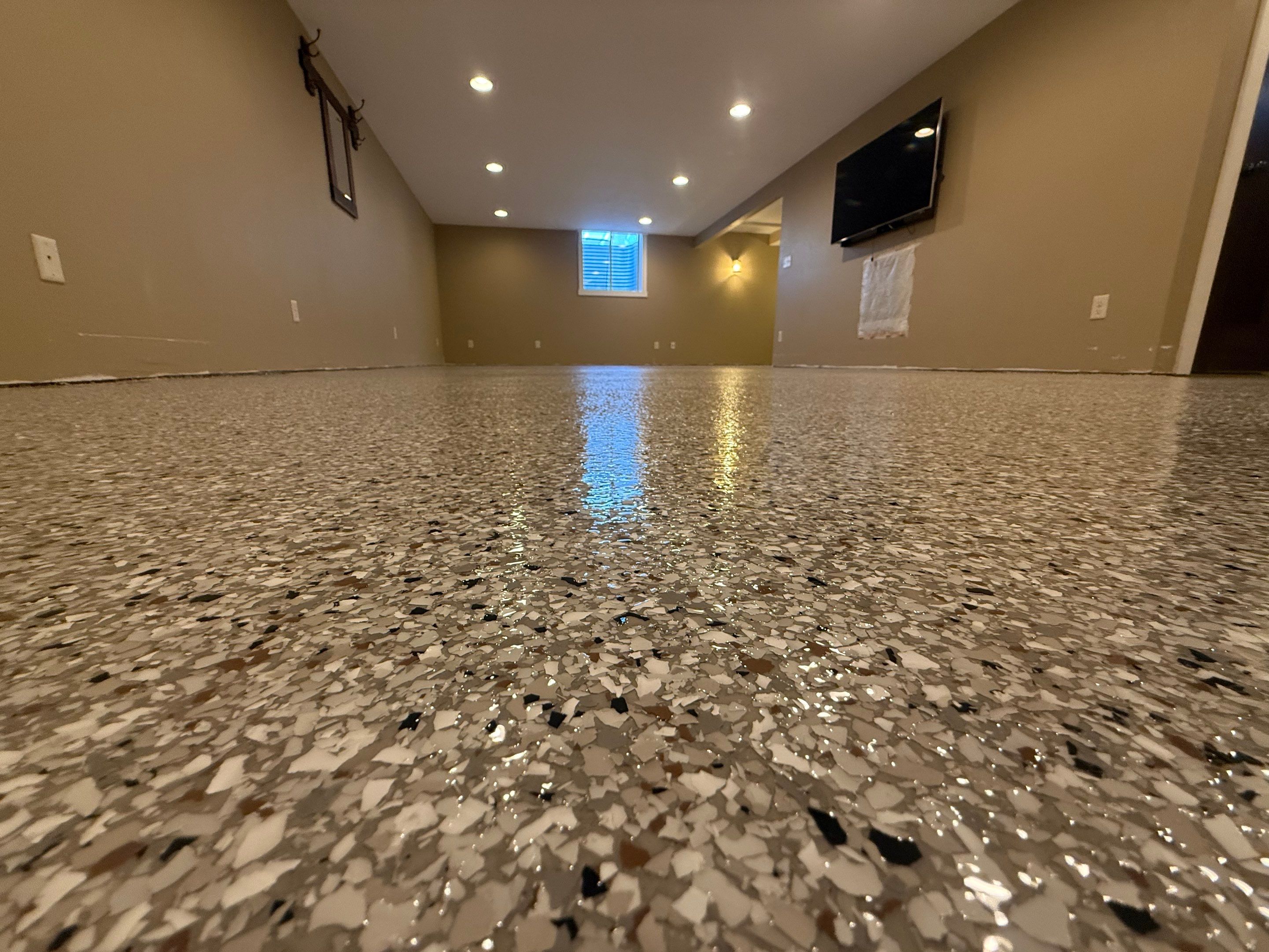 Decorative Flake Concrete Floor Coating for Larchwood Basement by Select Painting, Coatings & Garage Cabinets