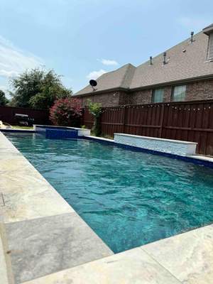 Freeform Pool with Raised Spa and Rock Waterfall