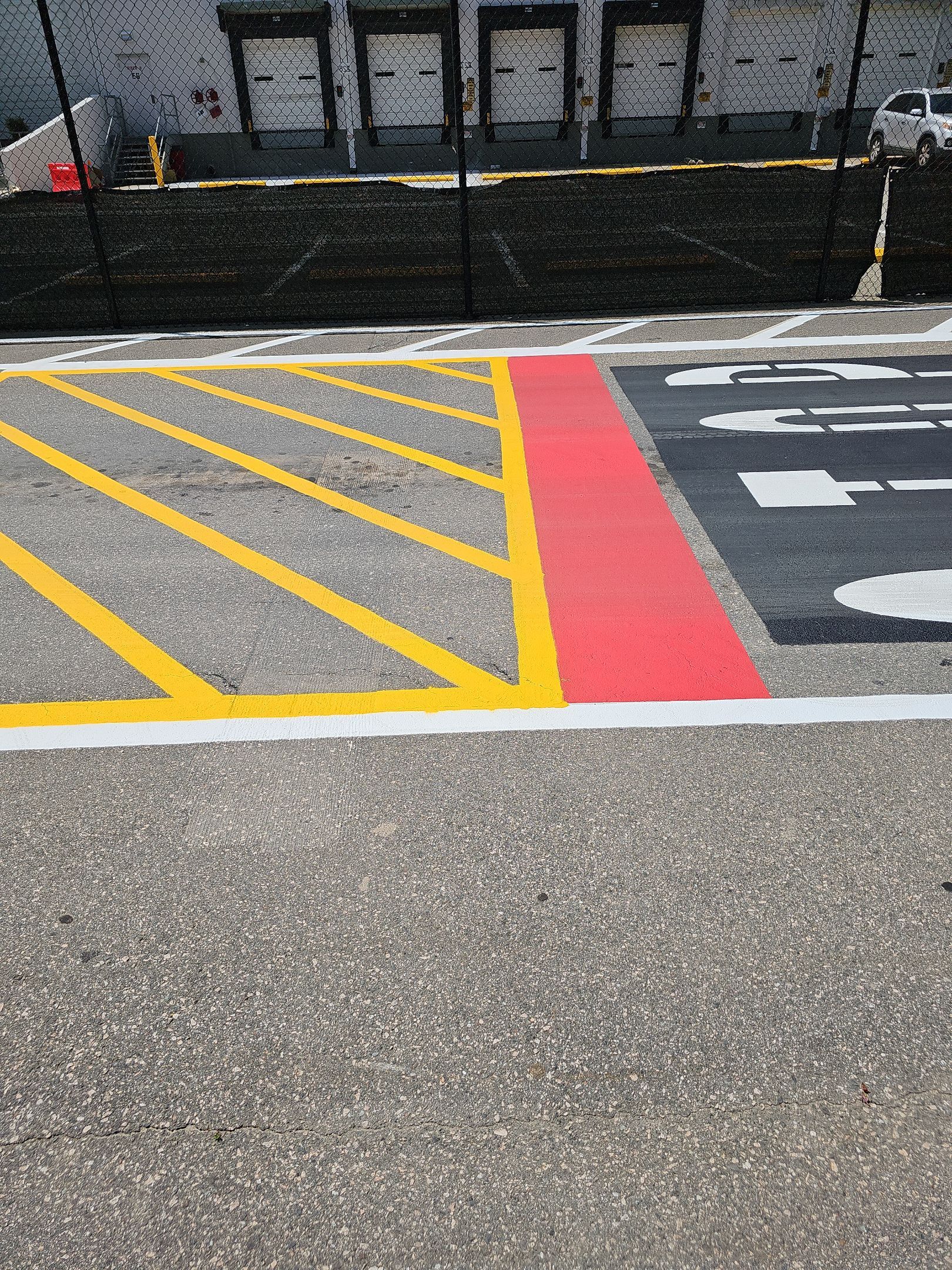 Striping Amazon Parking Lot  by Billy Weatherspoon Contractor