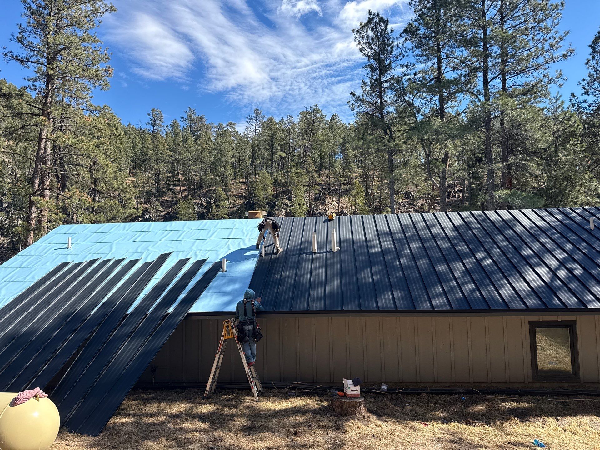 Residential Roofing Installation using Steel Roofing by Weather-Tite Exteriors LLC