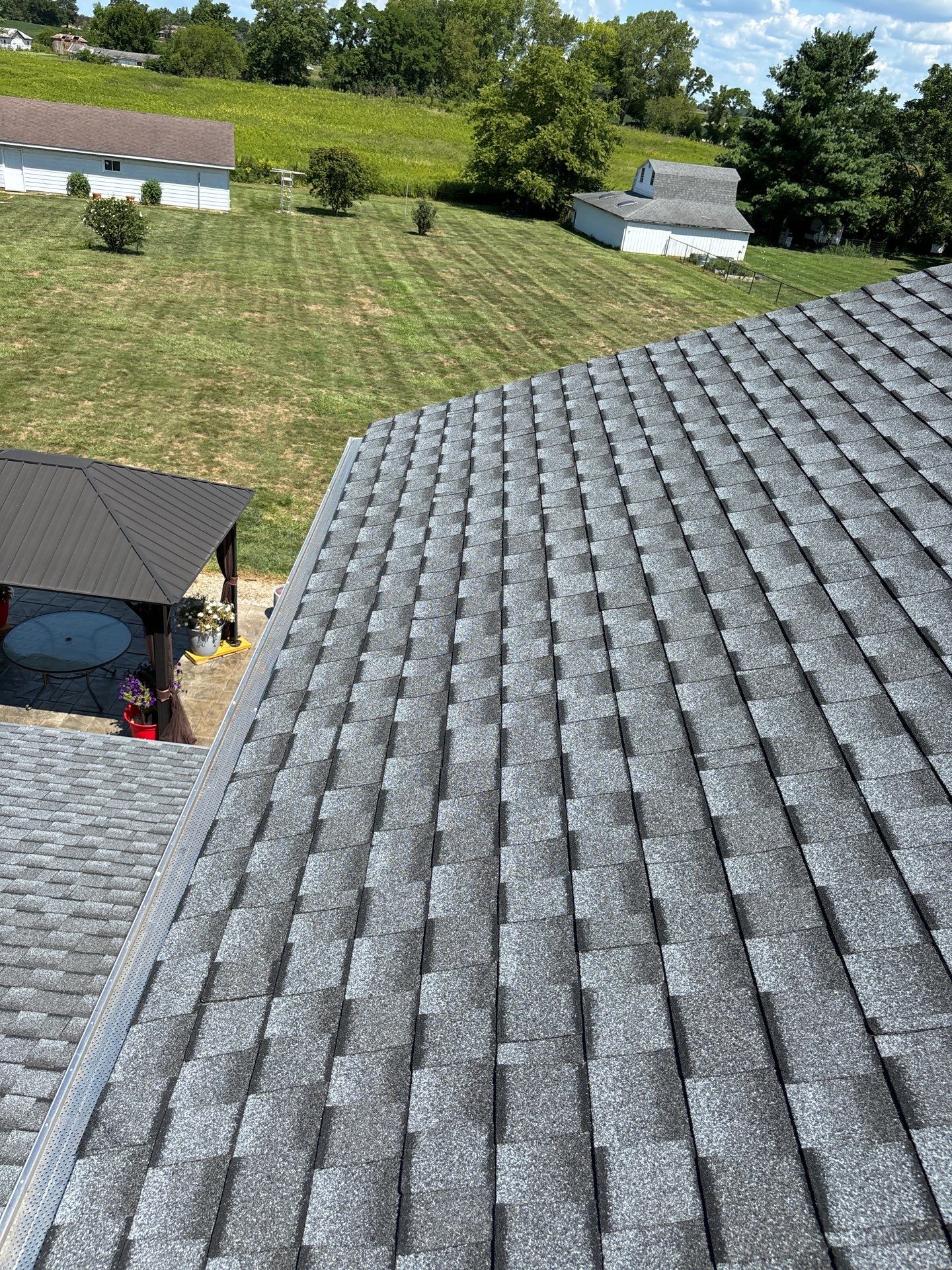 Residential Roofing Installation using Timberline UHDZ Shingles - Pewter Gray by RoofX 