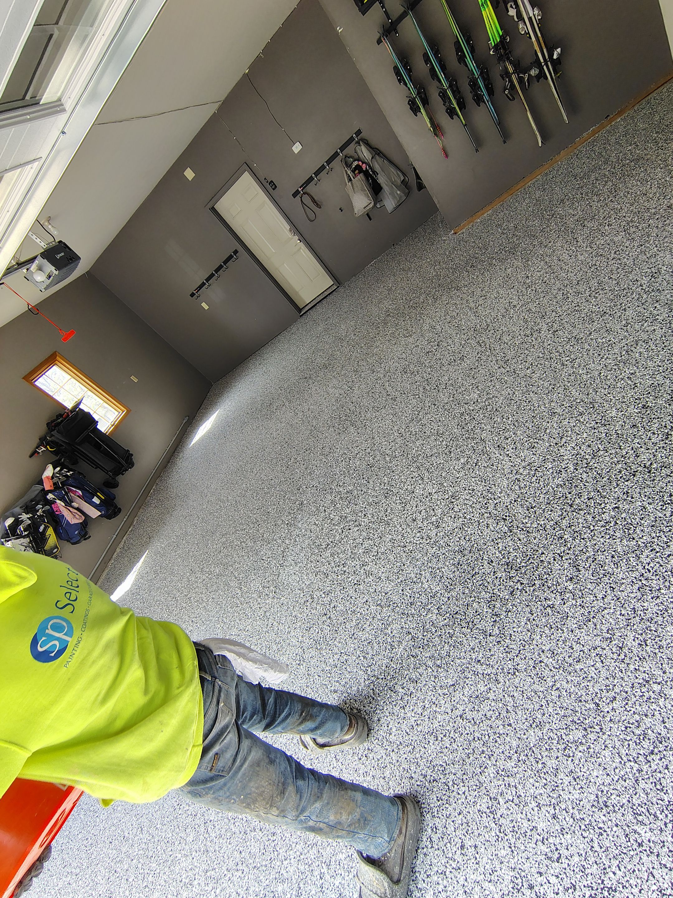 Garage Floor Concrete Coating and Crack Repair in Sioux Falls by Select Painting, Coatings & Garage Cabinets