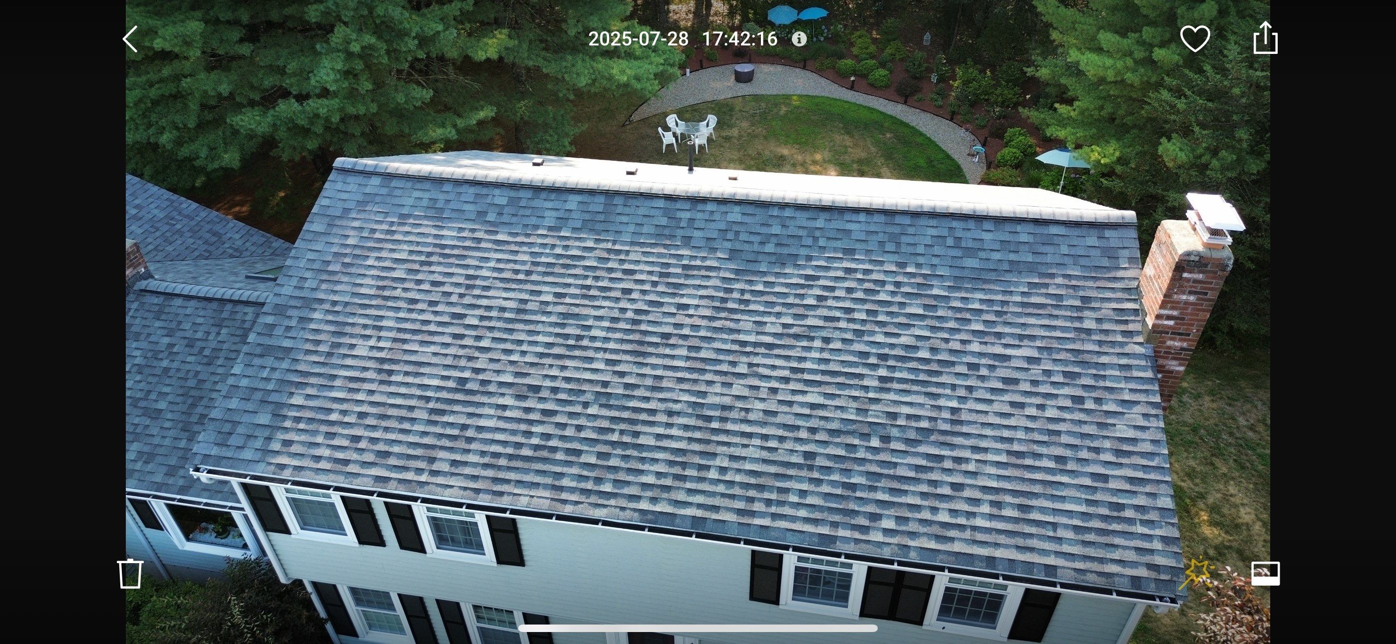 Complete Roof Replacement with Chimney Flashing, Gutter Guard System, and Vinyl Siding Repairs by Mighty Dog Roofing of Greater Middlesex County