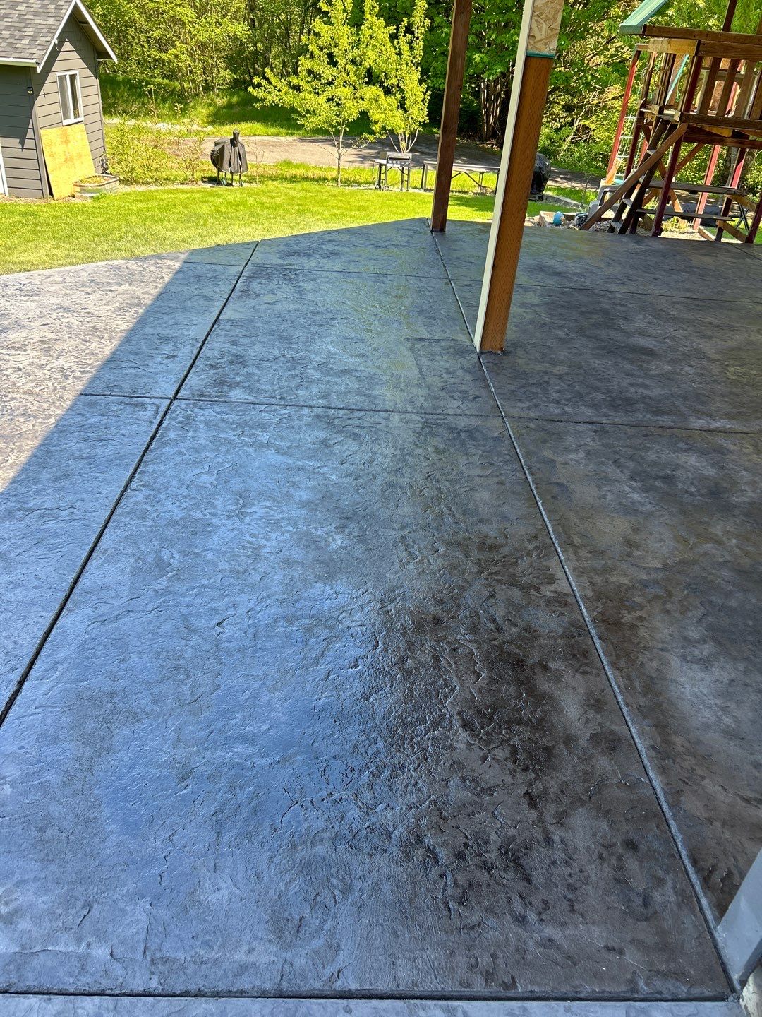 Ty | Concrete Patio by Jireh Asphalt & Concrete Inc 
