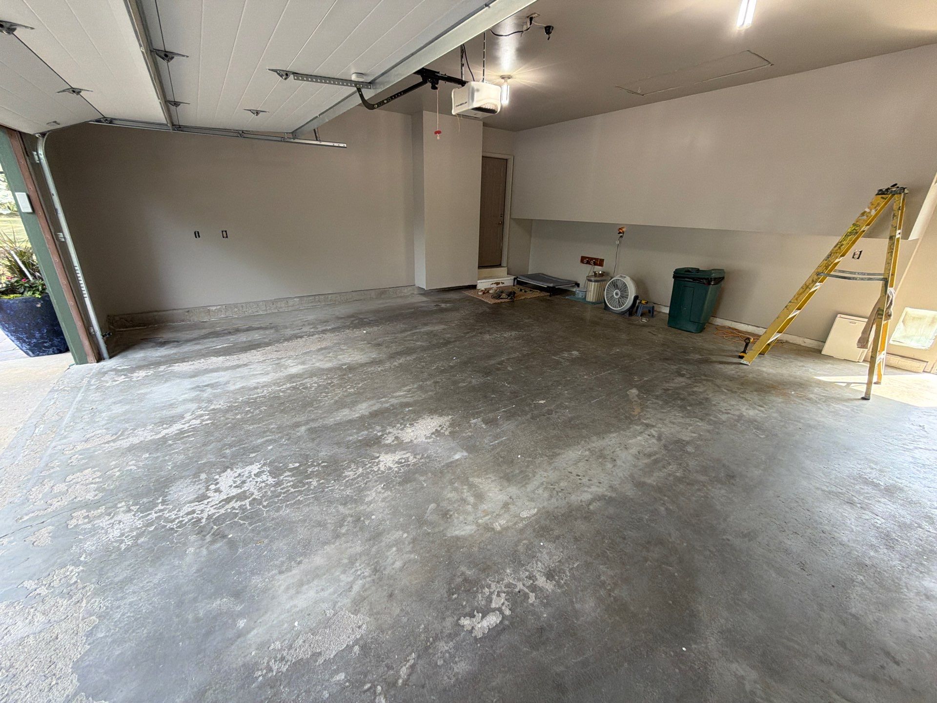 Garage Floor Coating with Decorative Flakes in Tea by Select Painting, Coatings & Garage Cabinets
