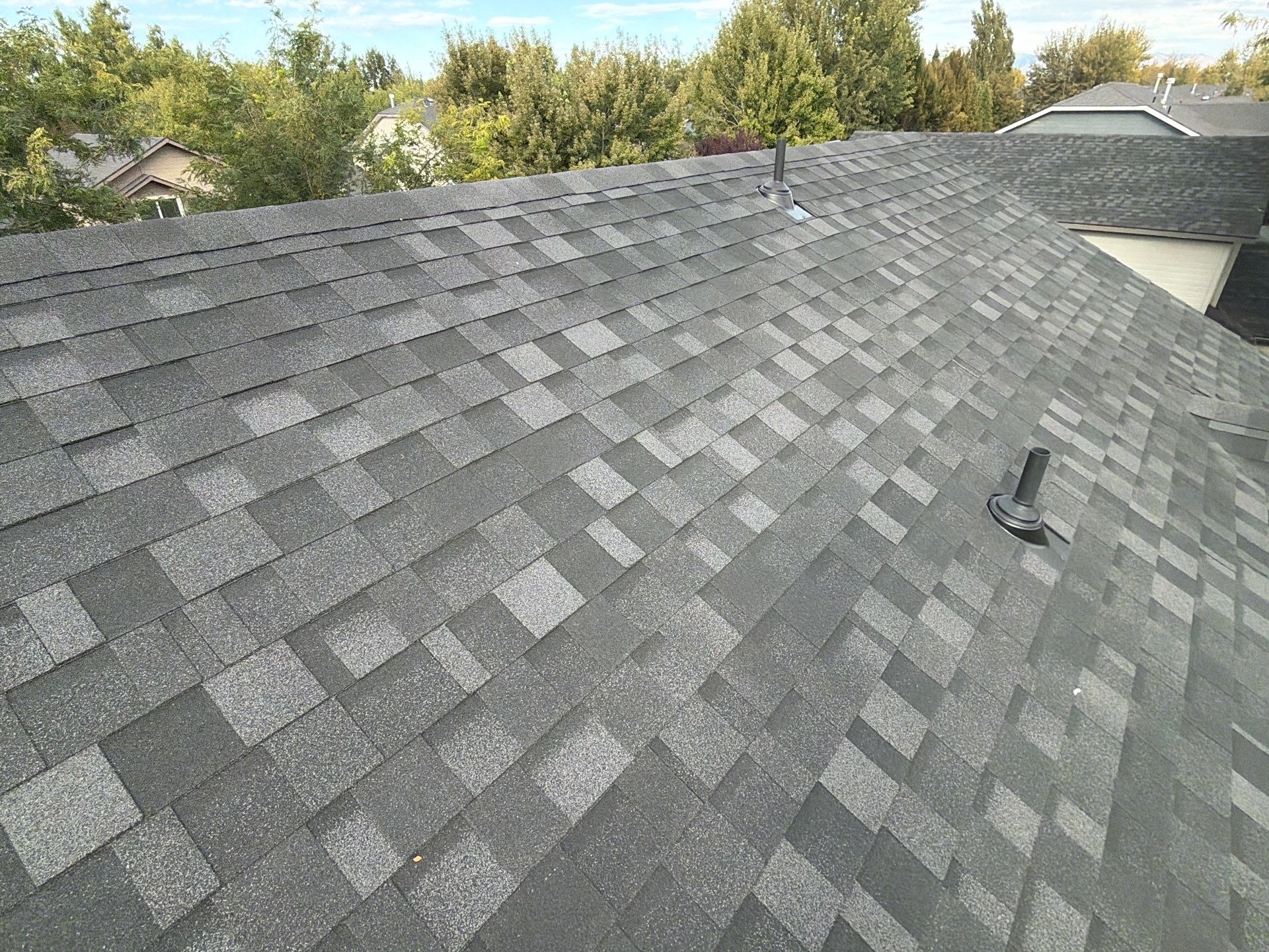 Residential Roof Replacement in Meridian Featuring Charcoal Architectural Shingles by Olive Roofing