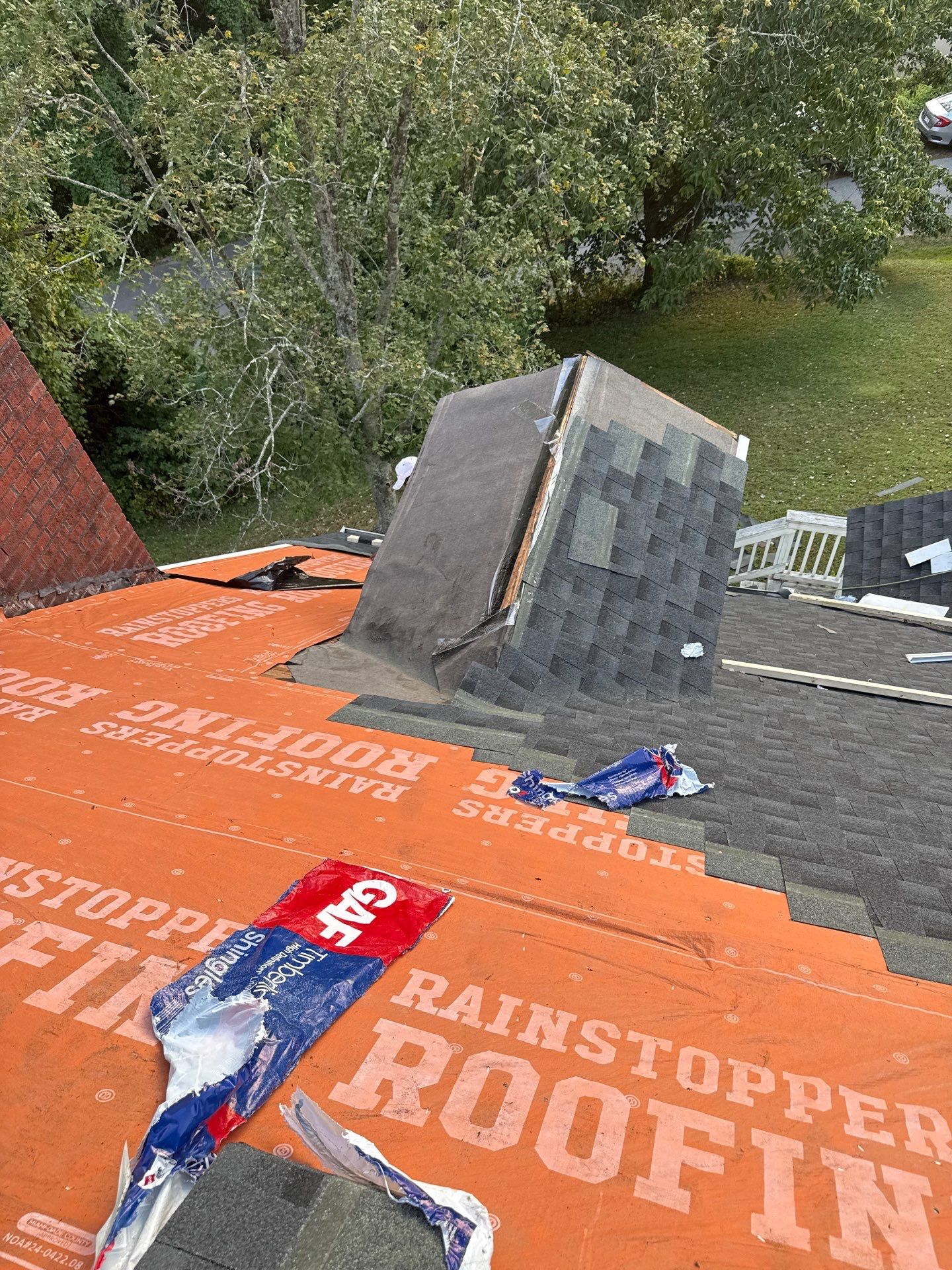 Residential Roofing Installation using GAF Timberline HDZ Charcoal by Rainstoppers Roofing