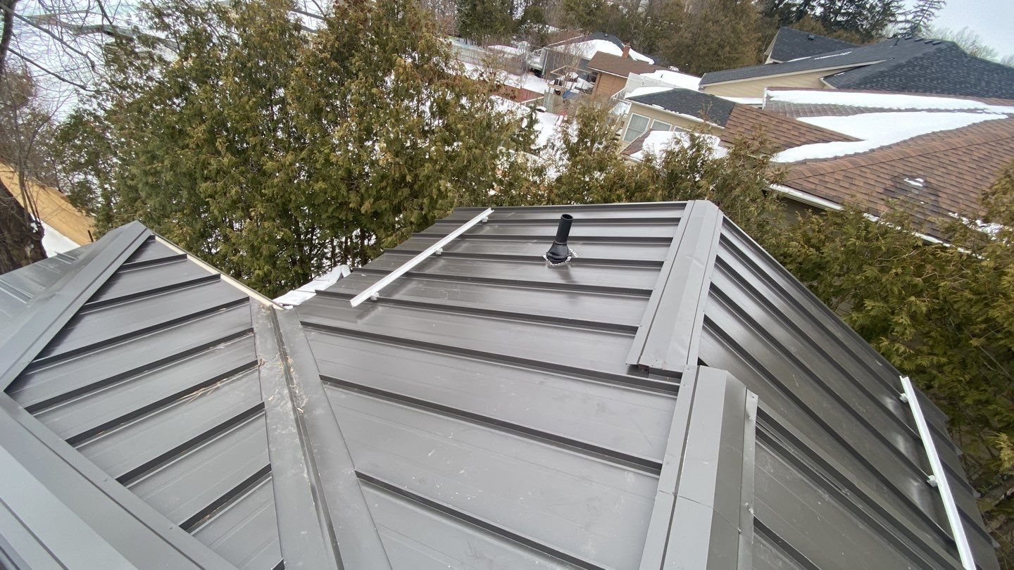 Residential Roofing Installation using 16" Standing Seam Panels by Jay Carter Roofing & Sheet Metal