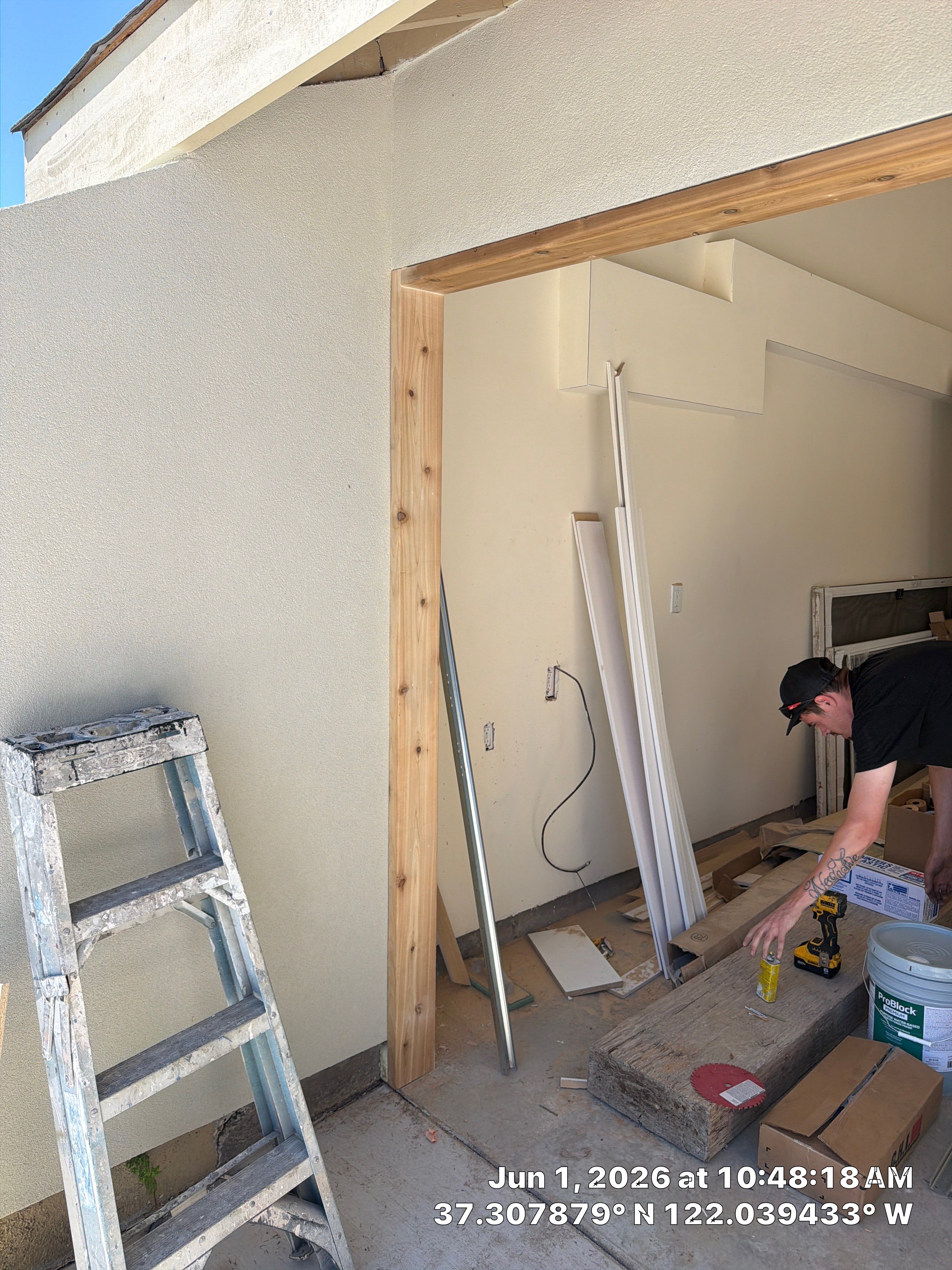 Modern Black Garage Door Installation With Vertical Windows In Cupertino by Valiant Garage Door