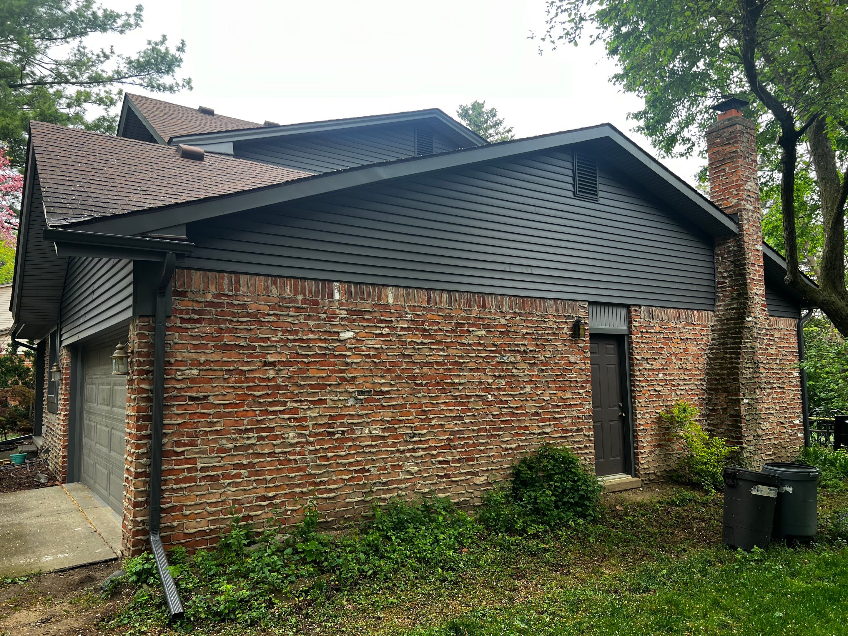 Siding Replacement  using Certainteed Monogram Vinyl D4" Smoky Gray color by Bloomfield Construction & Restoration