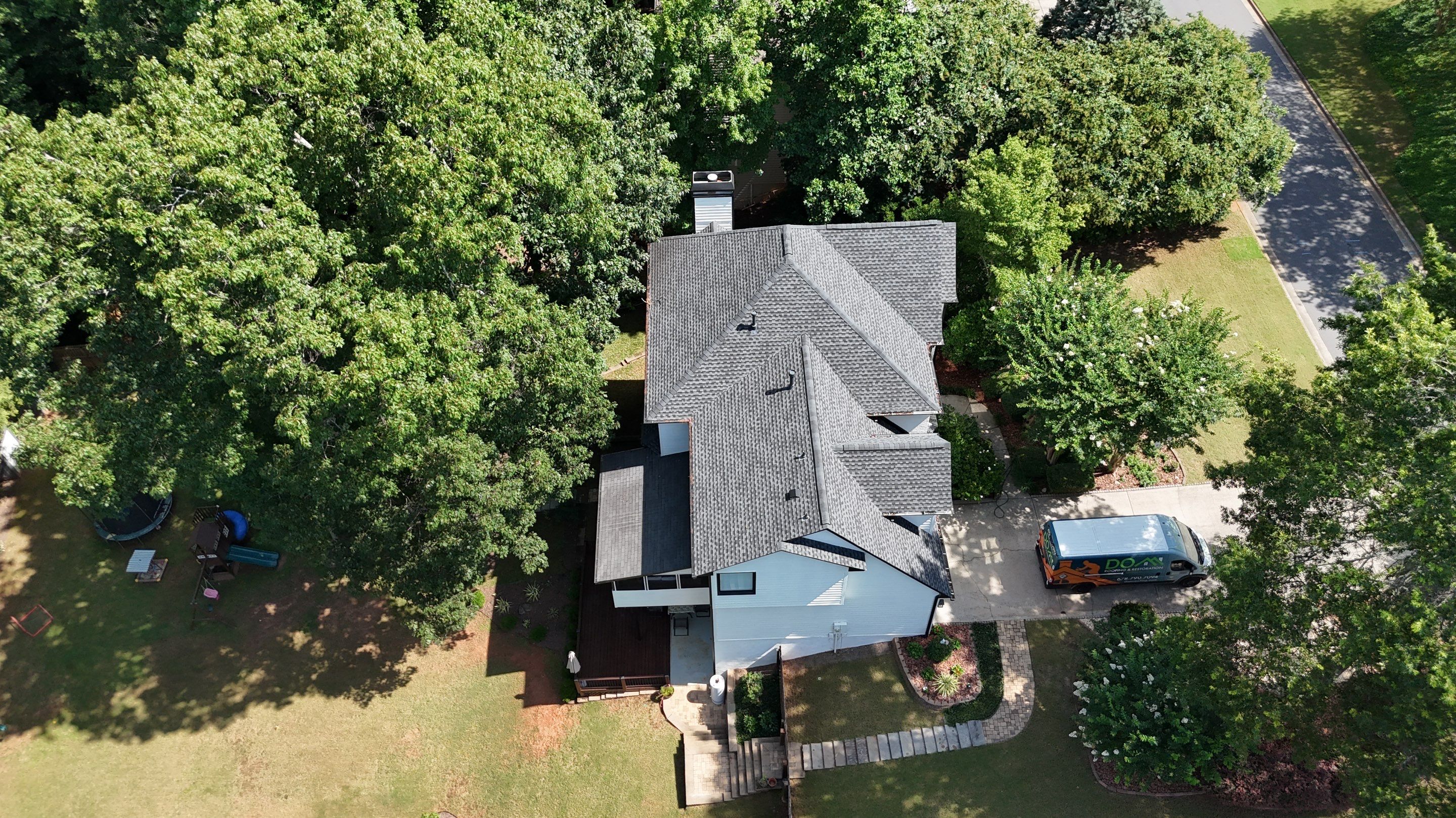 Barrett Downs Dr Cumming Roof Replacement  by Dom Roofing & Restoration