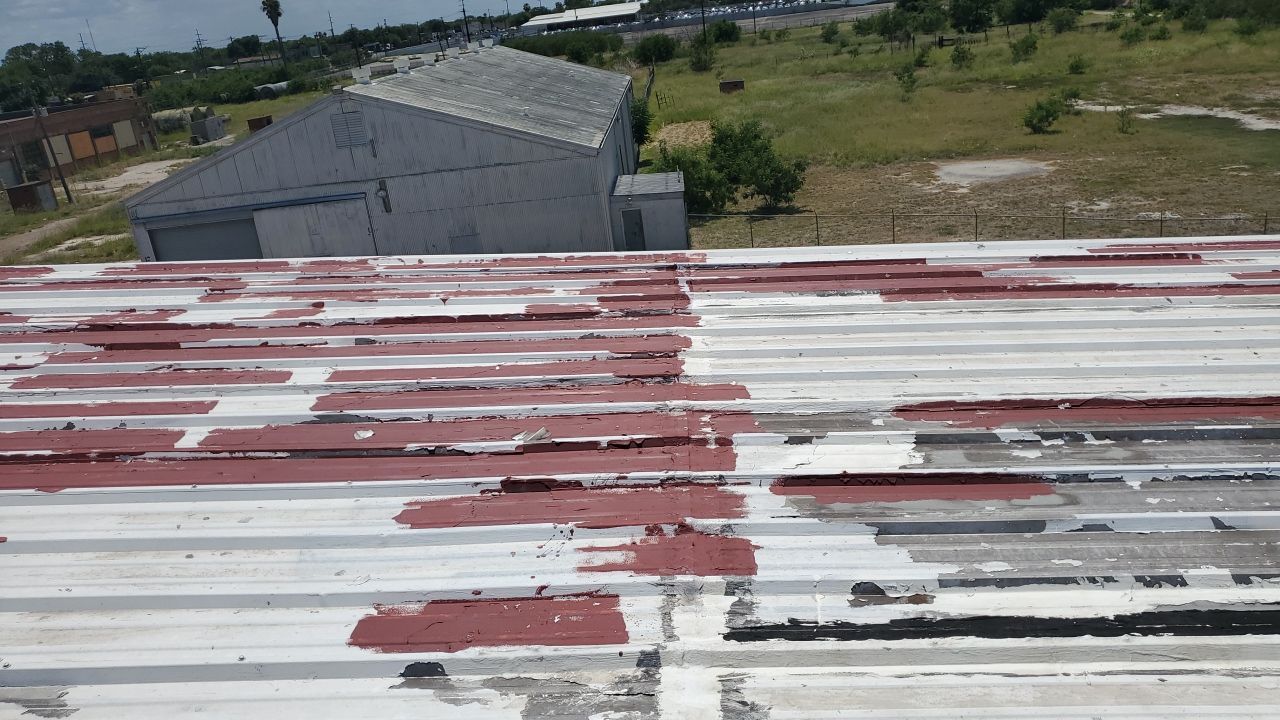 Commercial Roofing Installation using GAF 10 Year Acrylic System by Lighthouse Roofing