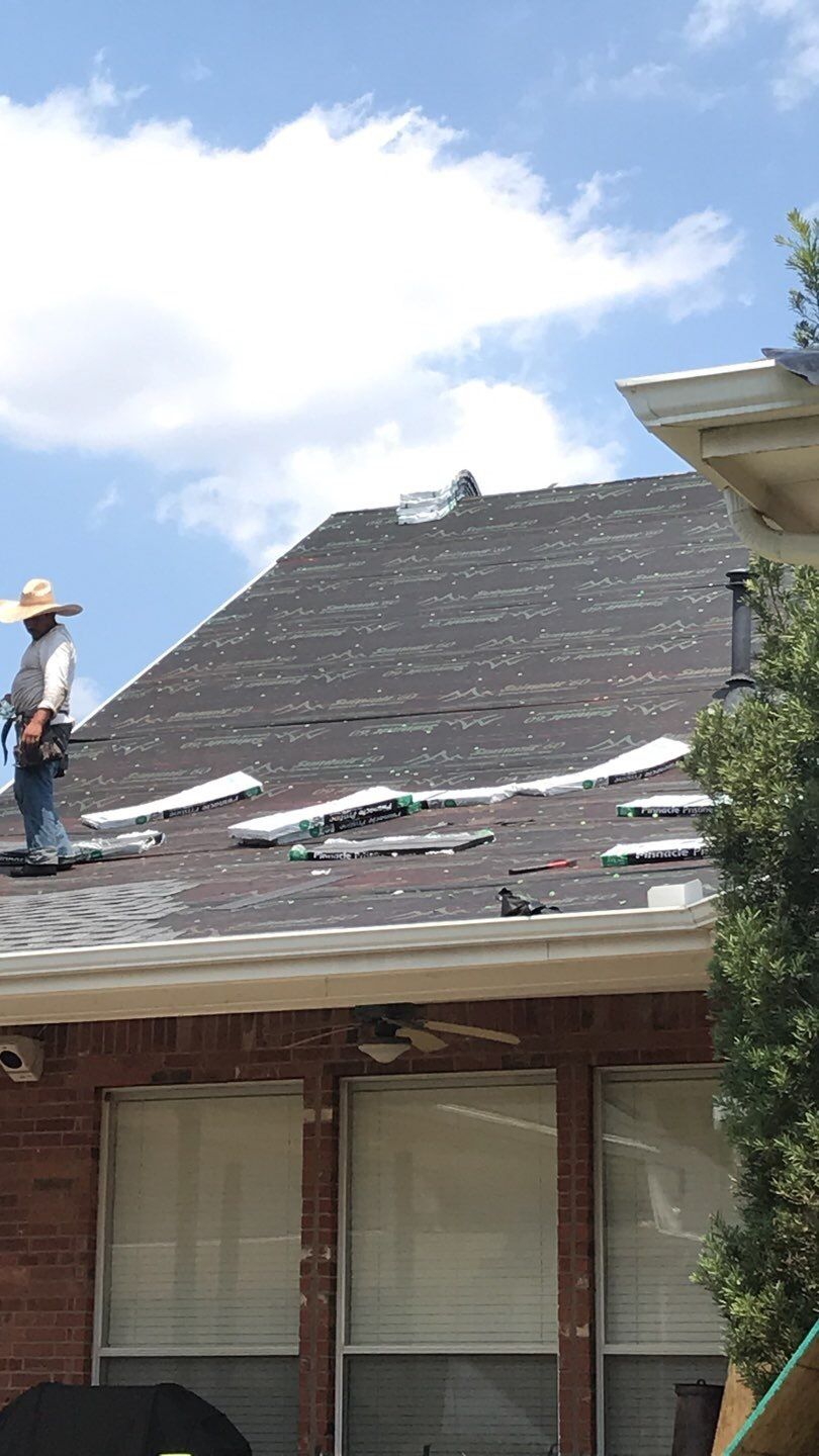 Roof and Gutter Replacement by Rainy Day Restoration