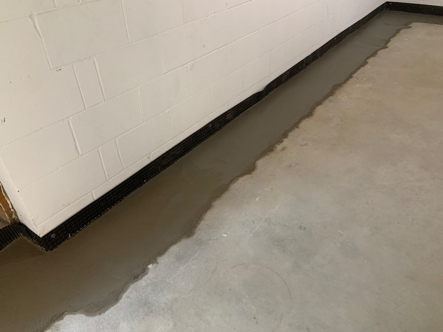 Correcting an Improper Installation for Alan in Chanhassen by Waterproofing Northeast