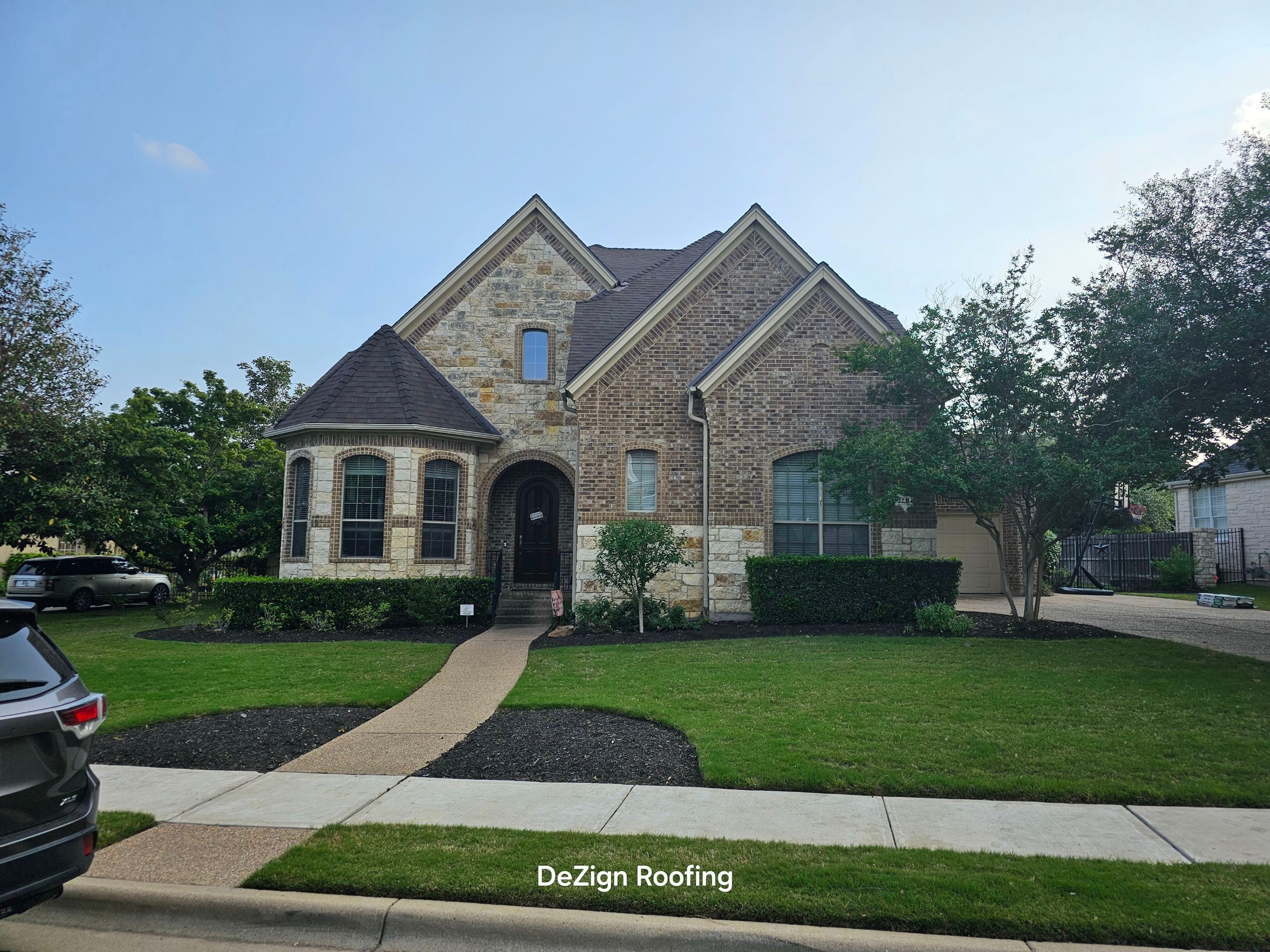 Residential Roofing Installation using Malarkey Vista Shingles Color Heather by DeZign Roofing & Exteriors