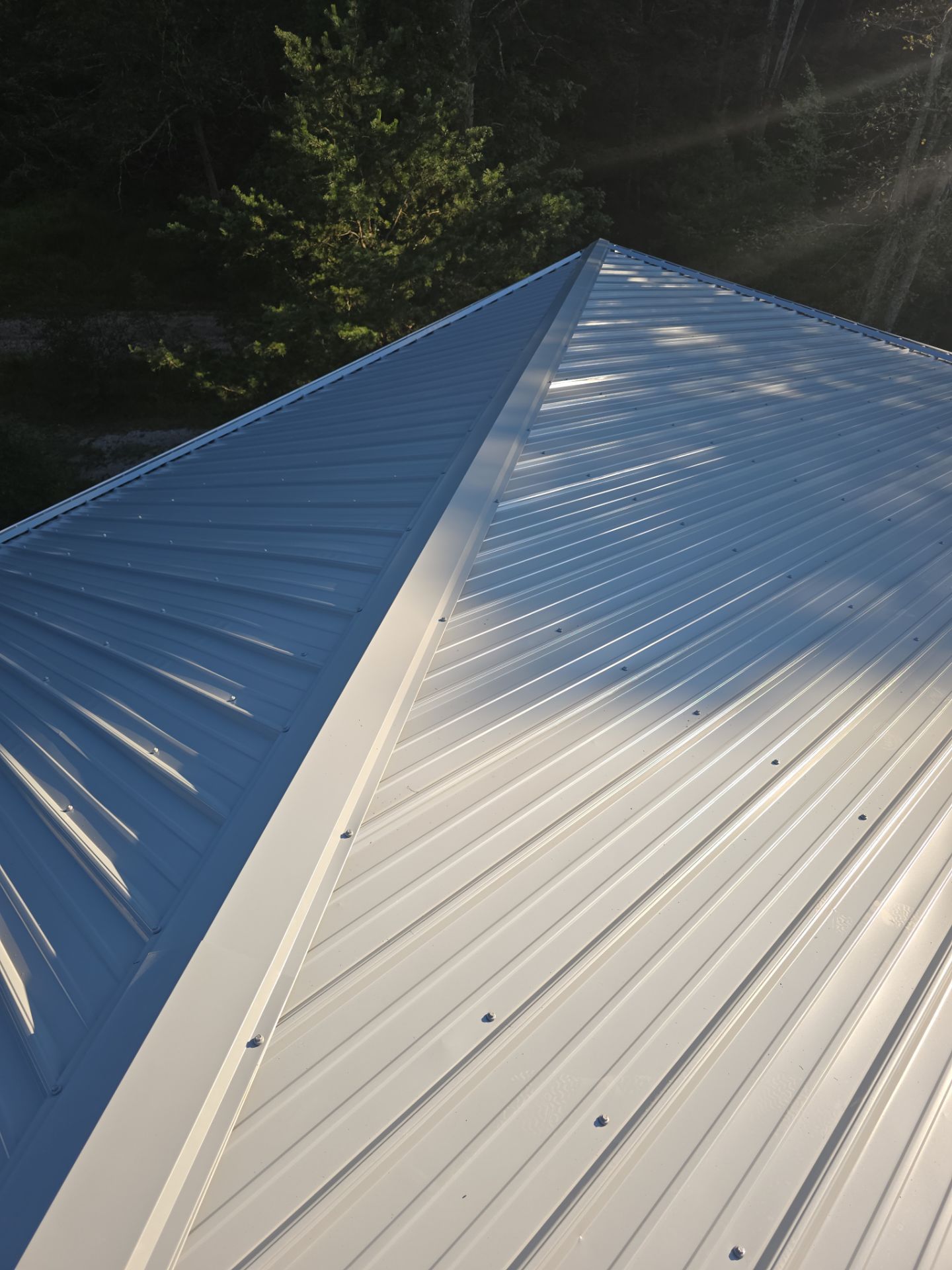 Residential Roofing Installation using Metal by Rainstoppers Roofing