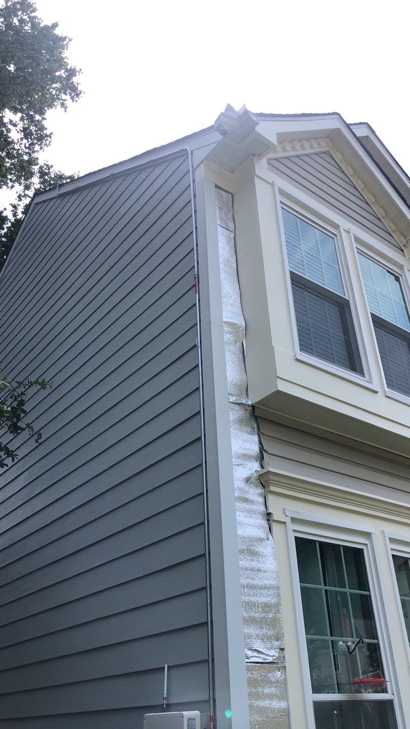 Exterior Home Makeover using GAF Timberline HDZ, GAF Decotech, and James Hardie Siding by American Home Contractors