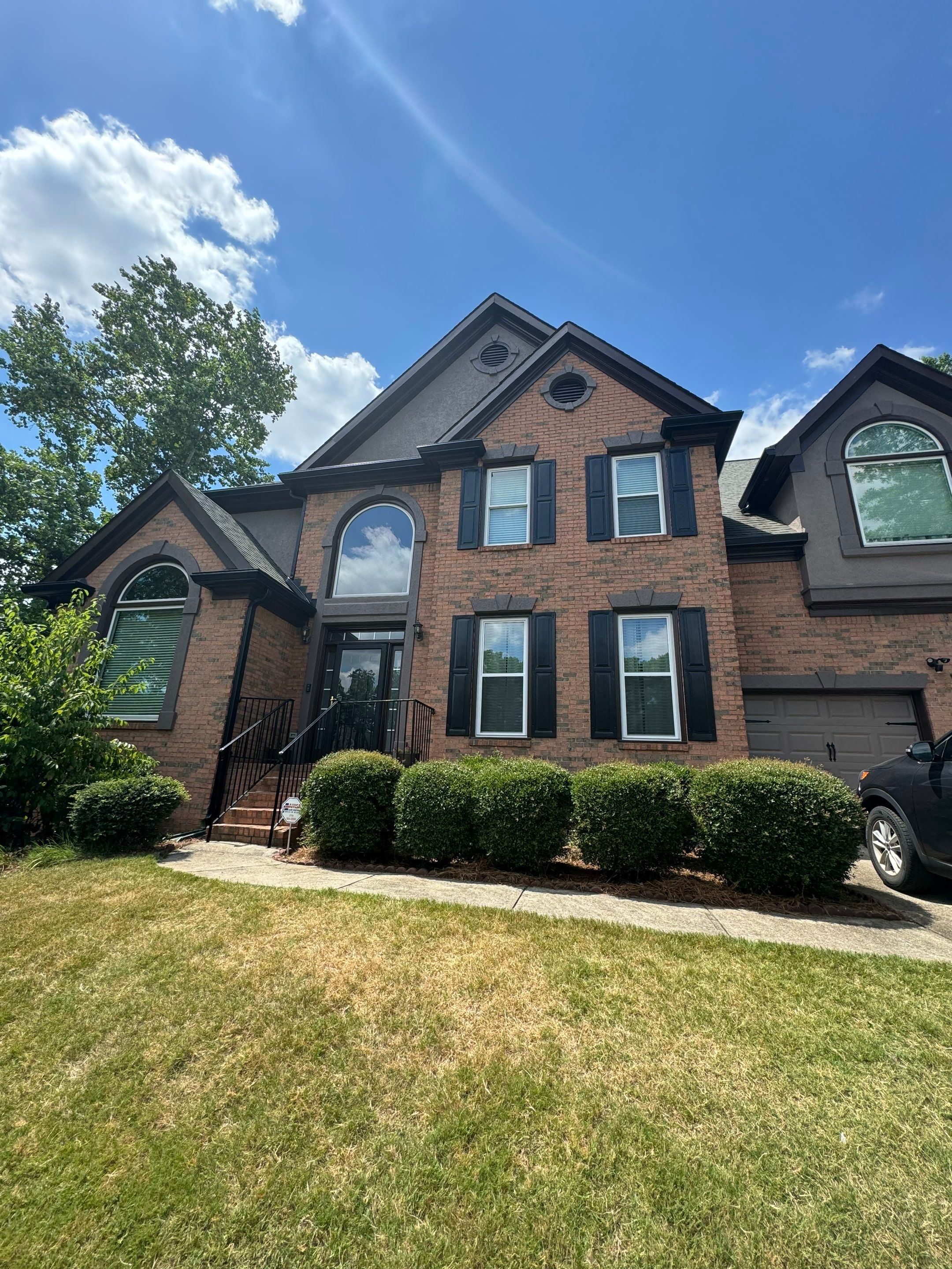 Full Exterior Painting and Gutter Replacement for Powder Springs Home by Swift Home Renovations