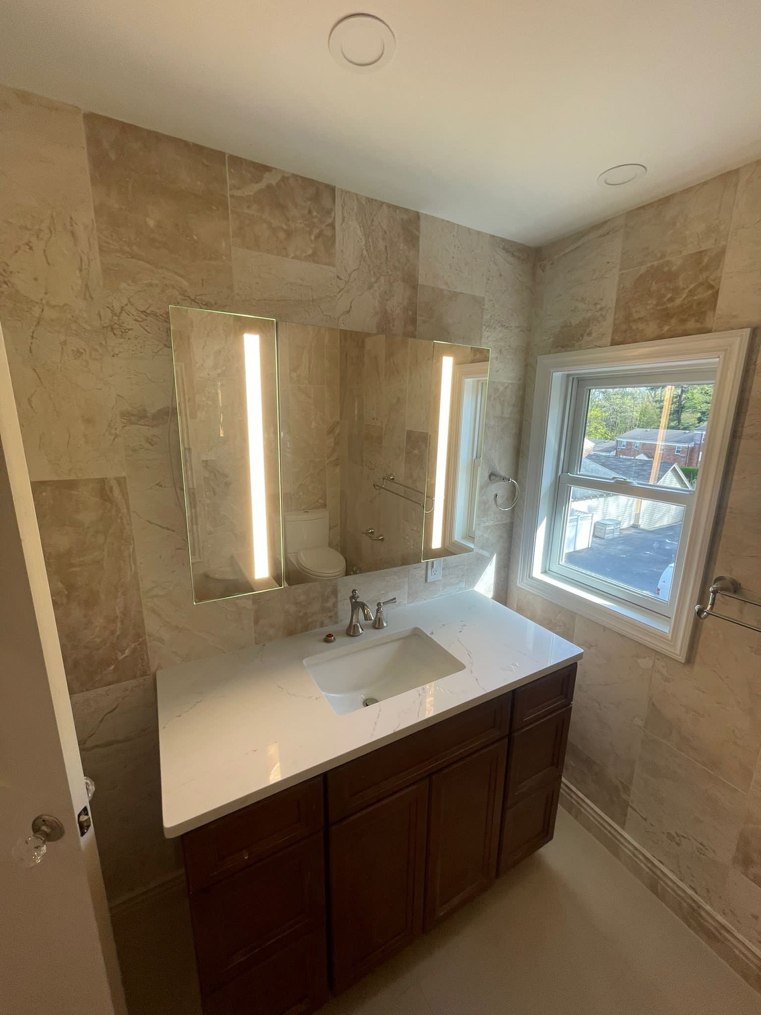 Bathroom Remodel using Tile by Home Concepts Construction