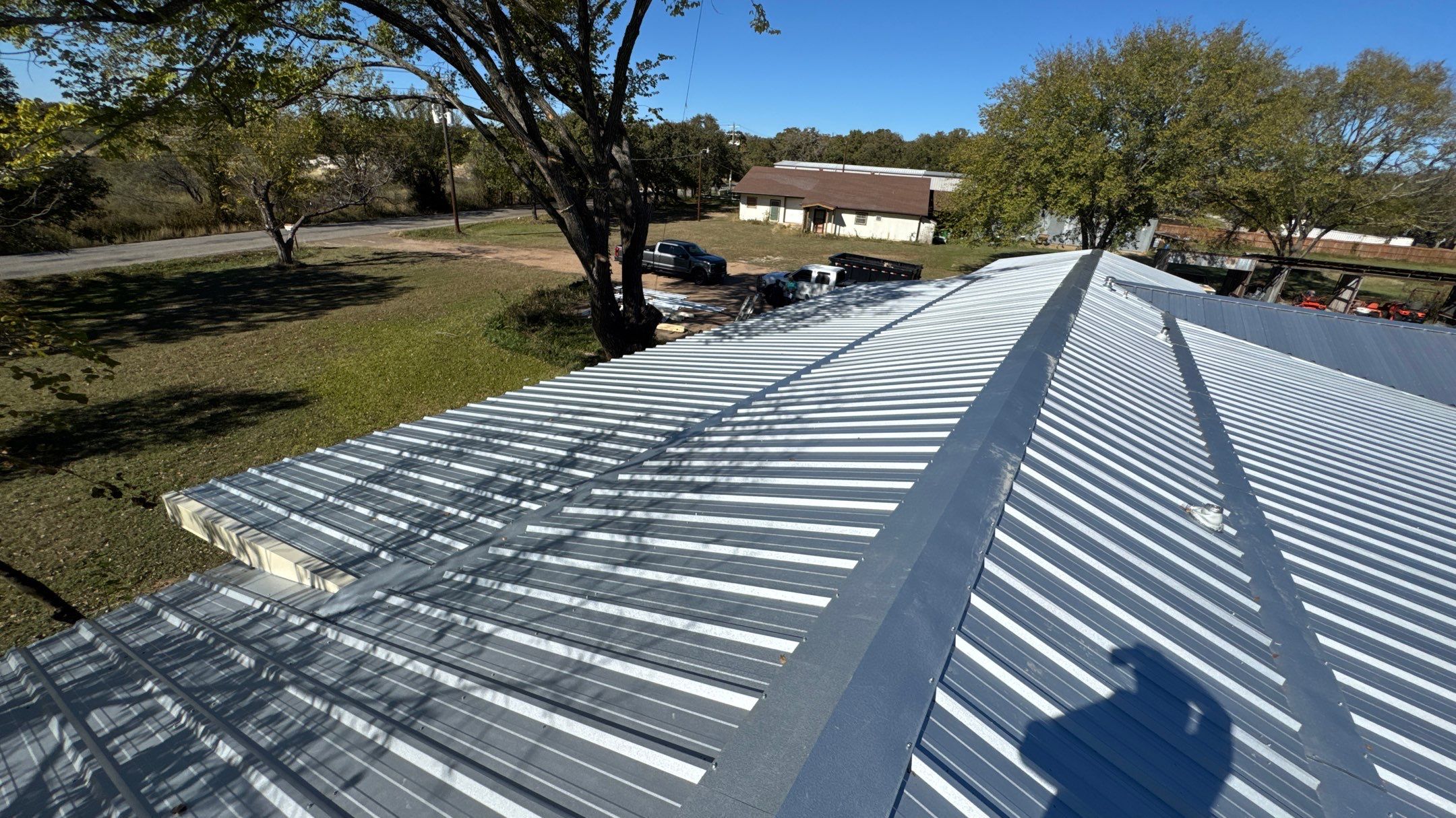 New Metal Roof  by Harvey Roofing & Construction