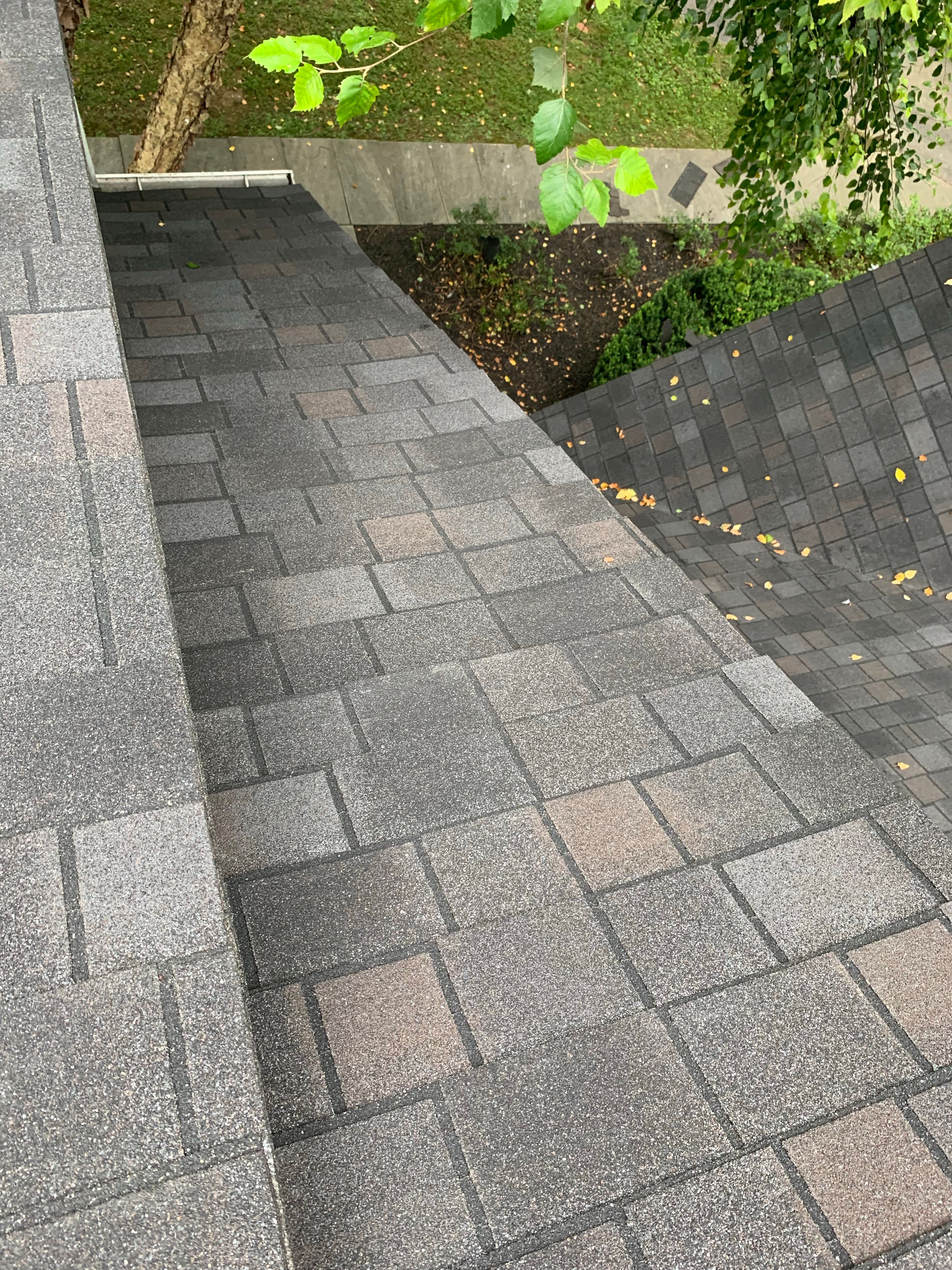 Skylight, Roof, and Gutter Replacement by American Home Contractors