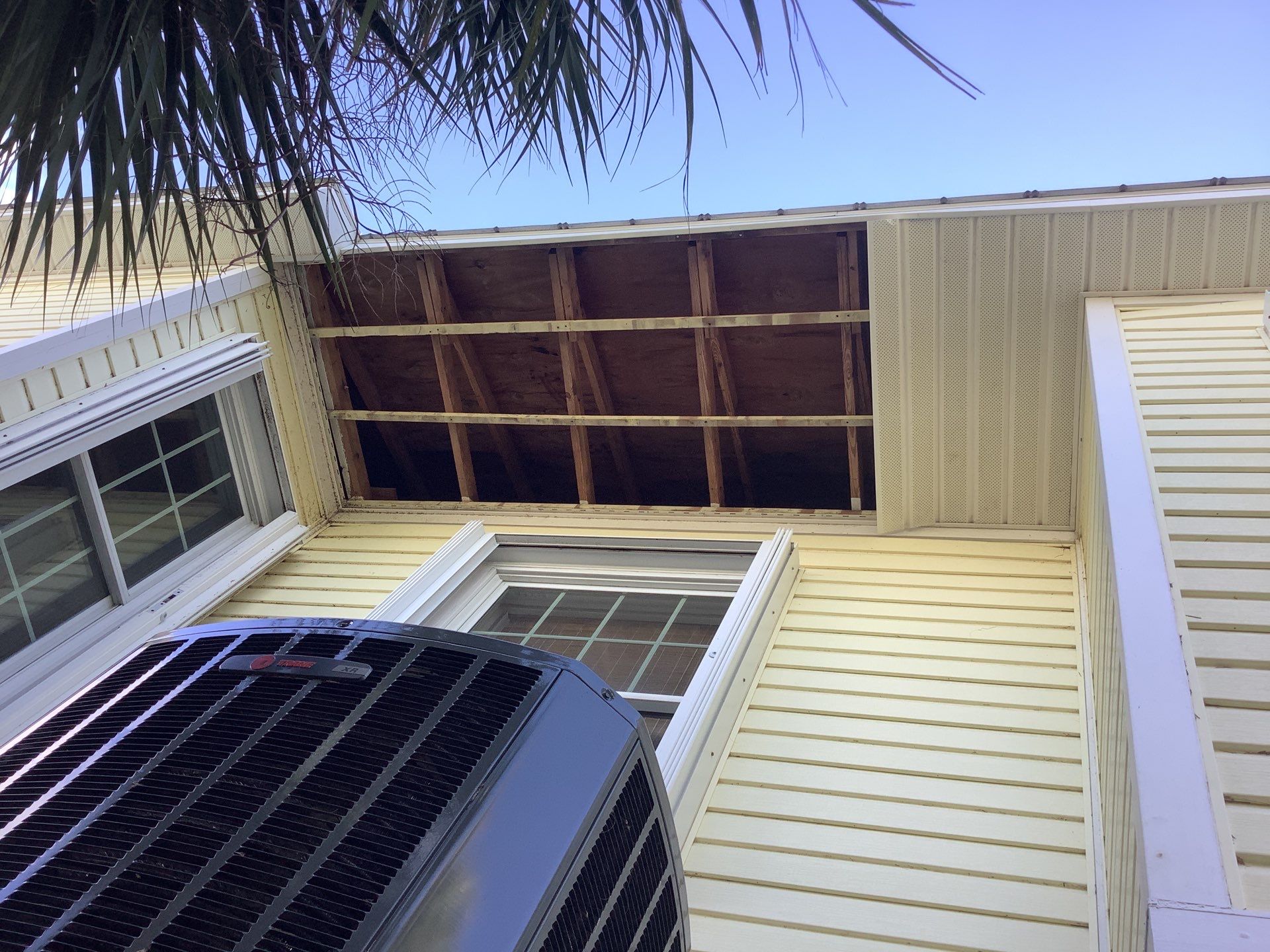 White Gutters with Matching Downspouts in Sarasota FL by Gutter Professors