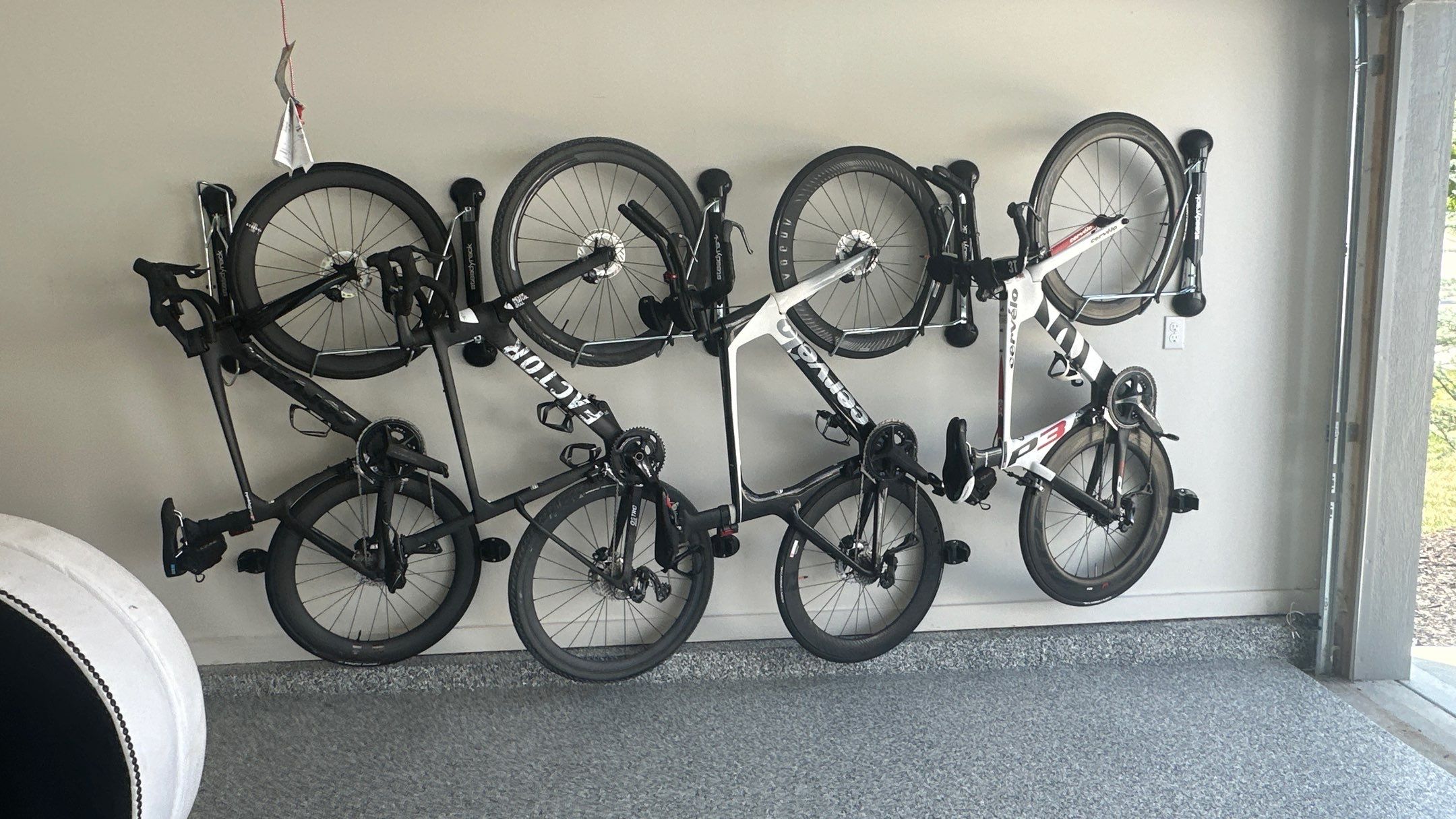 New bike storage for Jason E. along with some overhead racks  by Banner Garage