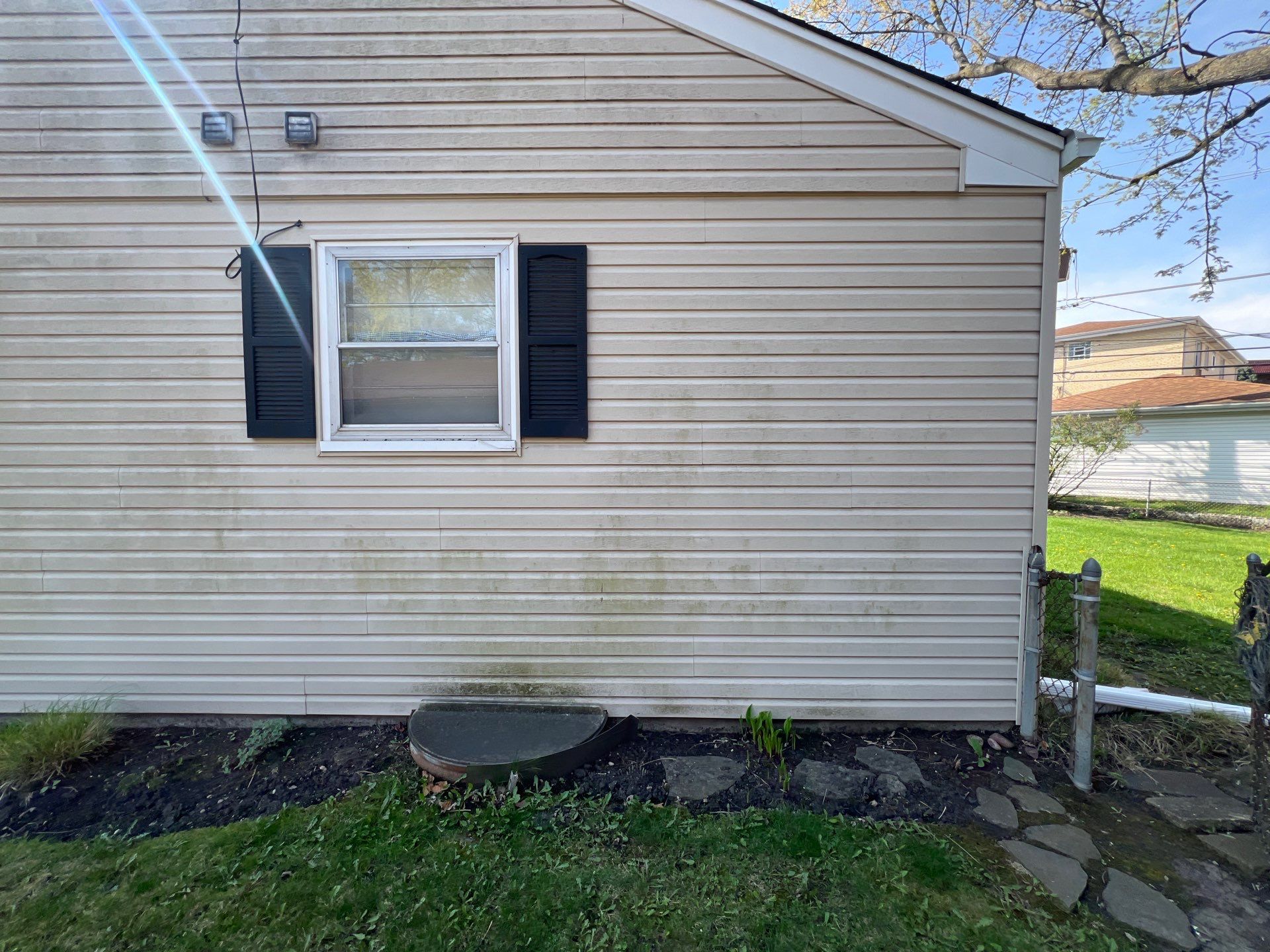 Housewashing  using Algaecide, soft wash soap by Northern Power Washing LLC.