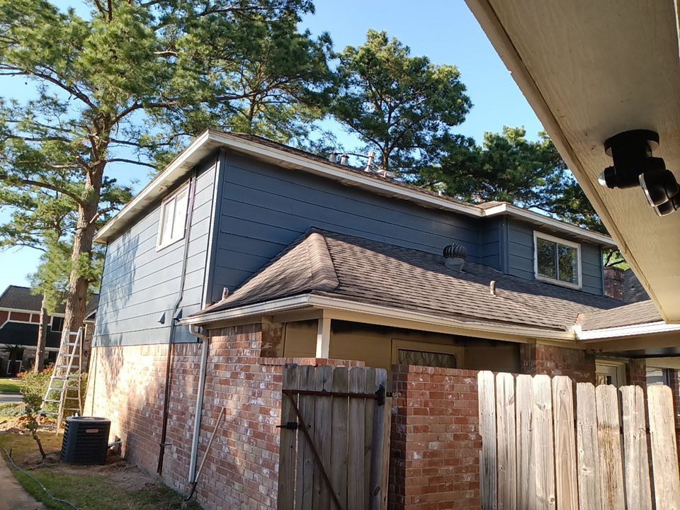 Interior and exterior painting project by Roof Concepts Construction