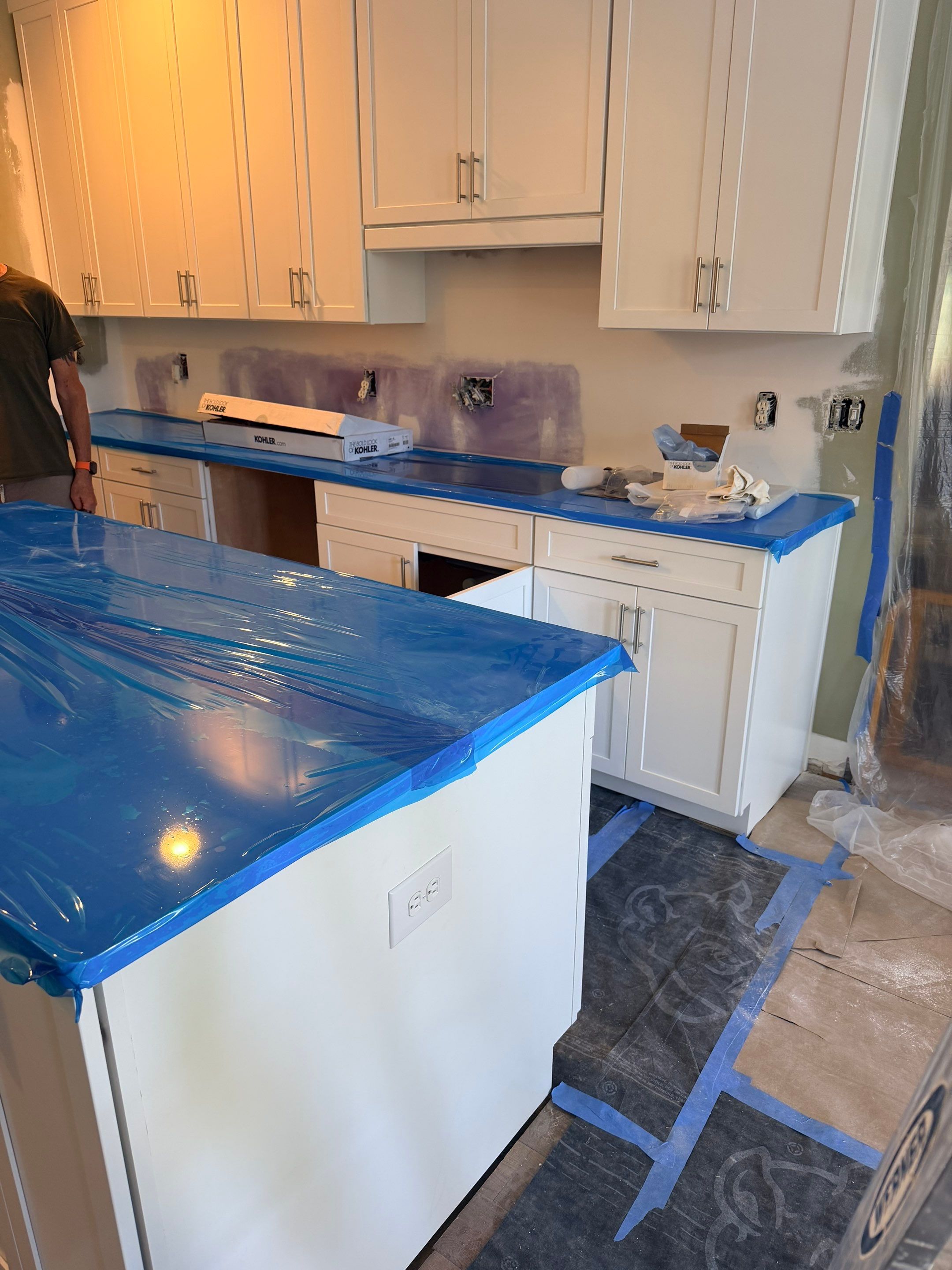 Complete Kitchen Renovation Featuring White Shaker Cabinetry in Fayetteville by Karcher Roofing & Construction