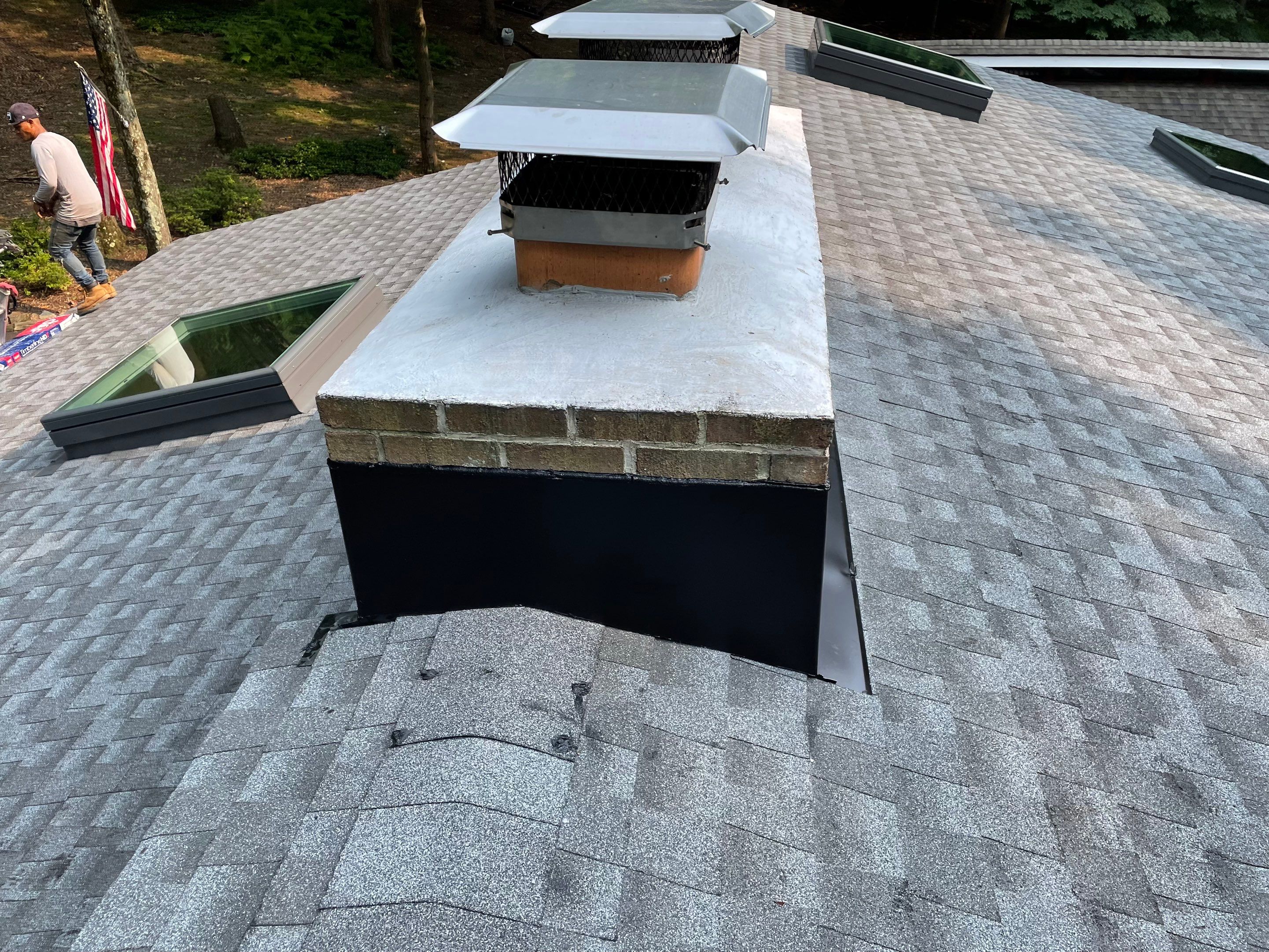 Deckhouse Roof Replacement by American Home Contractors