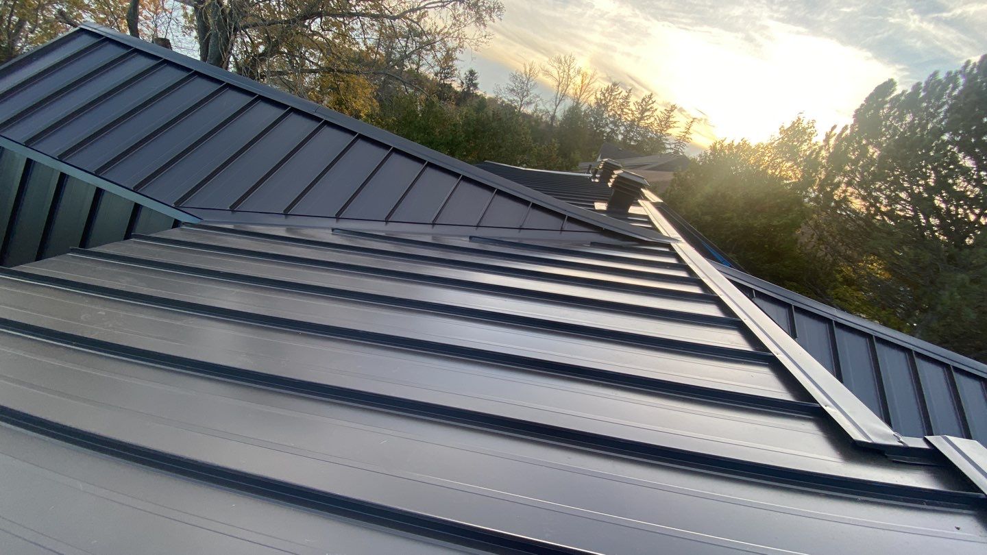 Residential Roofing Installation using 16" Standing Seam Panels by Jay Carter Roofing & Sheet Metal