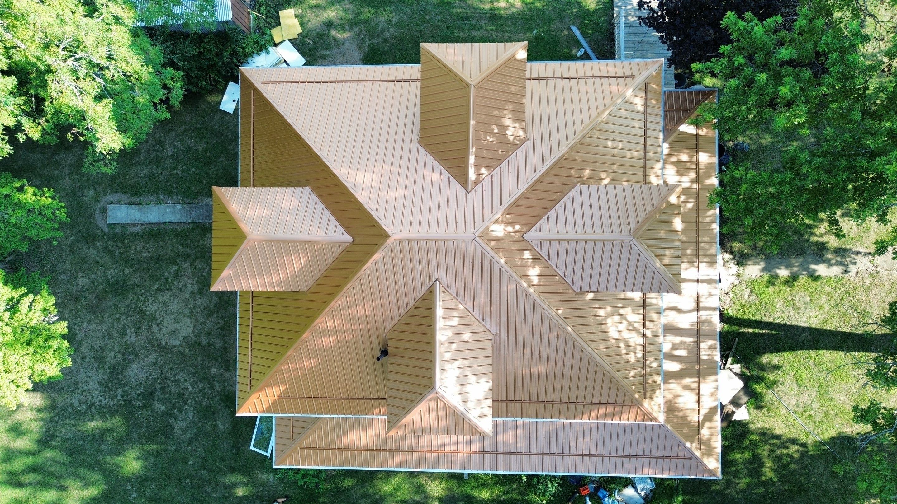 Residential Roofing Installation using Performance Panel Metal - Copper Metallic by RoofX 