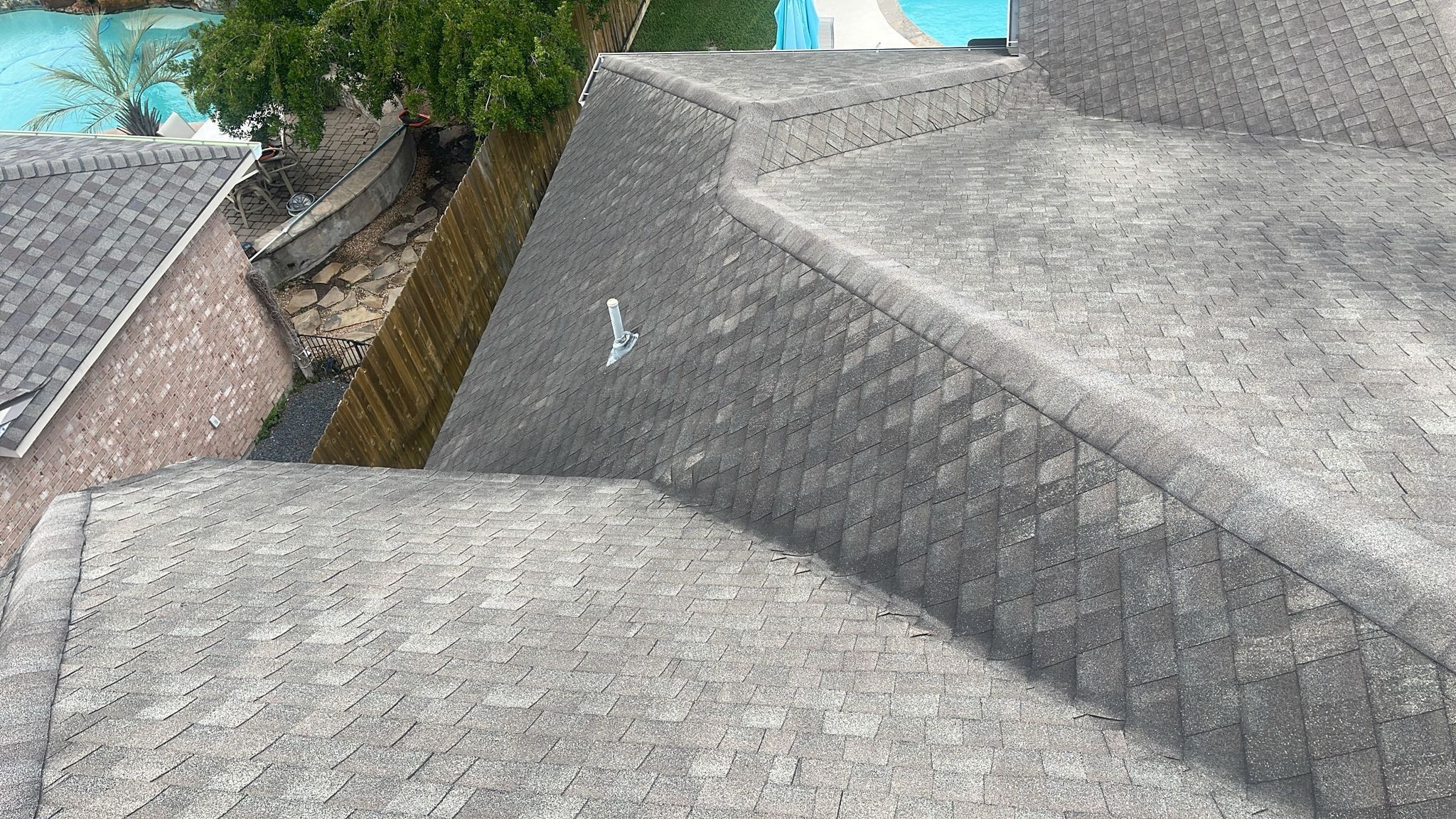Hail Damage using Owen's Corning Duration (Lifetime) Shingles by Roof Repair Company